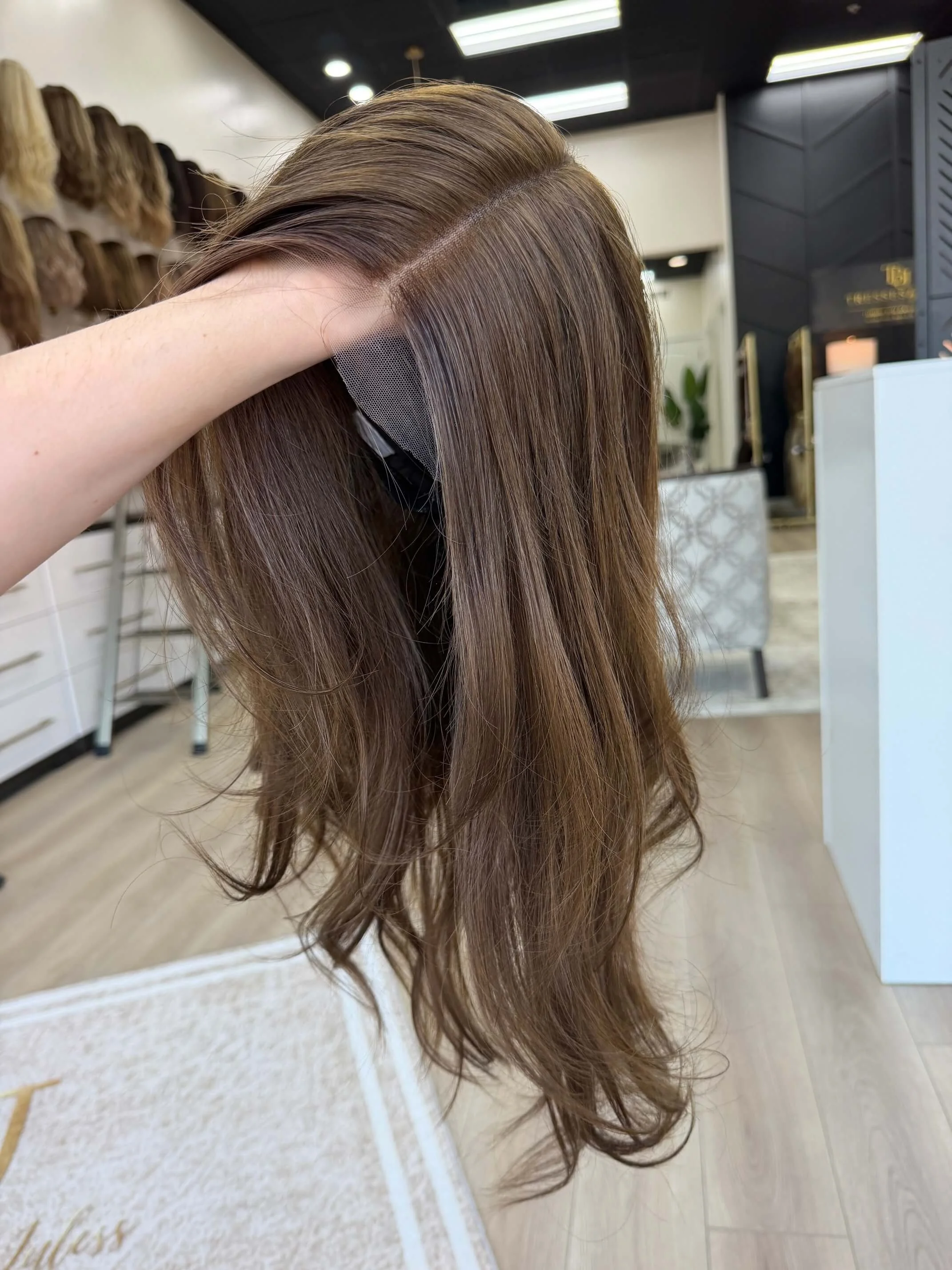24-inch brown human hair wig with a Velvet Luxe base