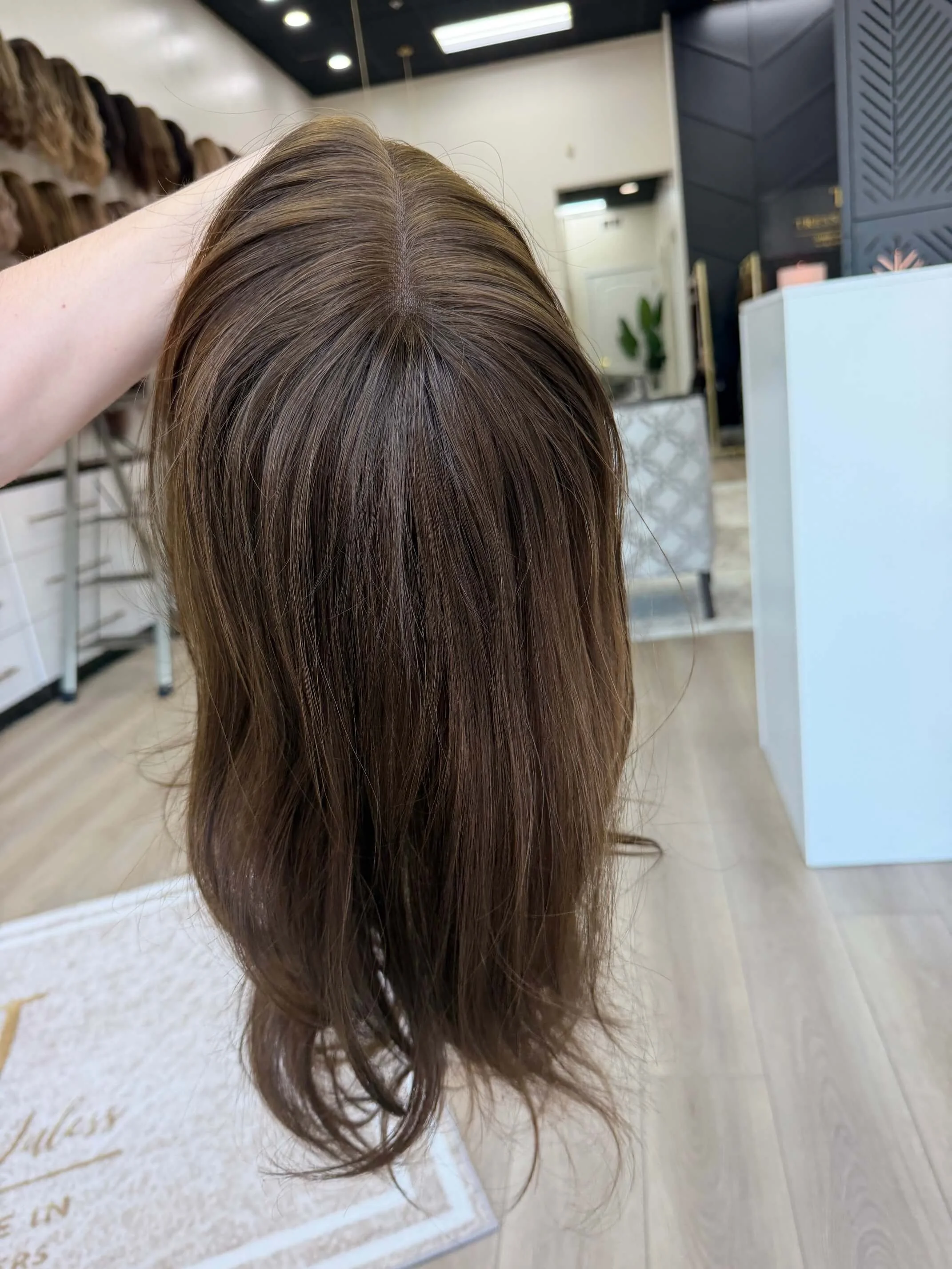 24-inch brown human hair wig with a Velvet Luxe base