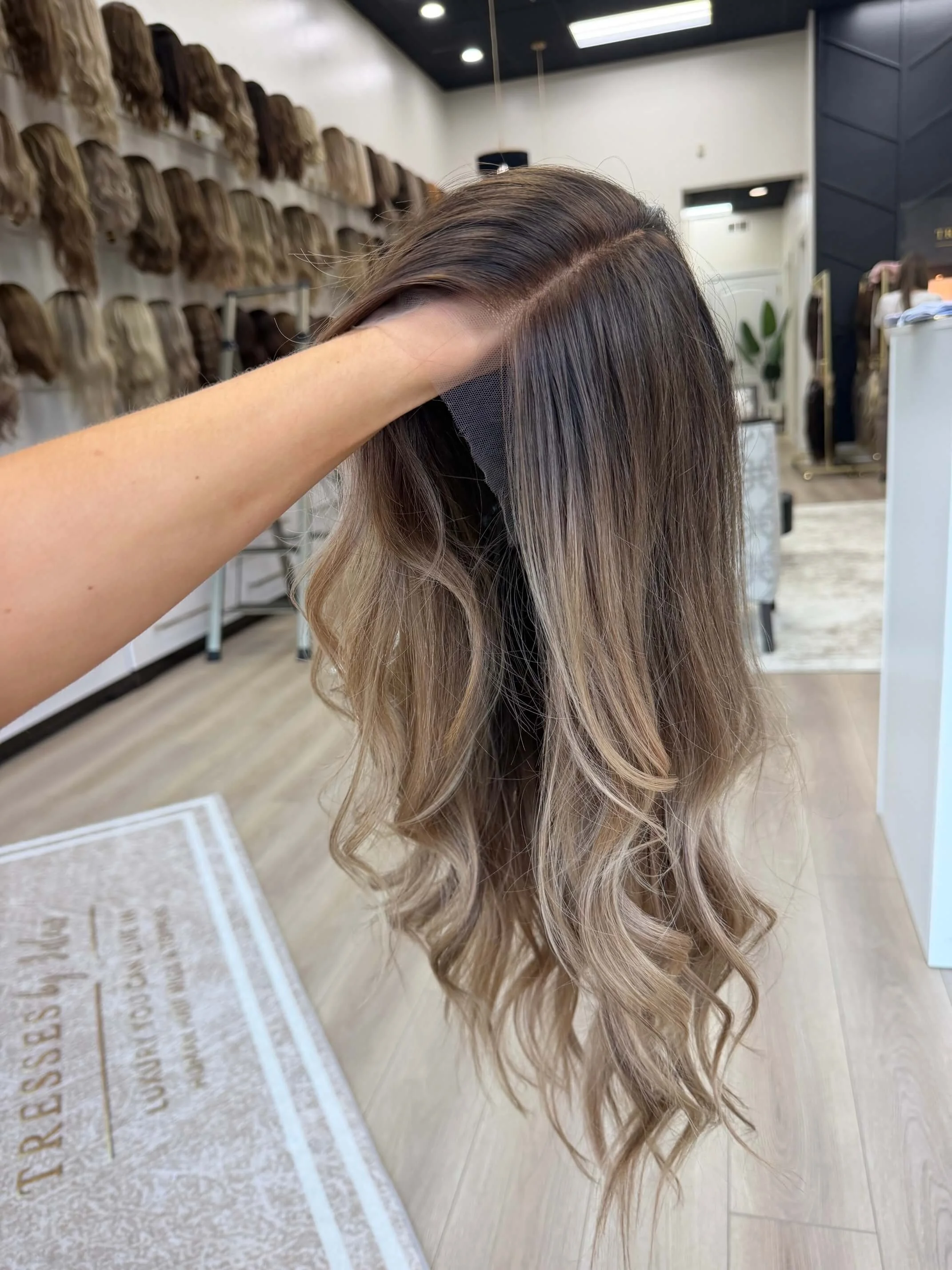 25-inch blonde Slavic human hair wig with a Diamond Lace Top base