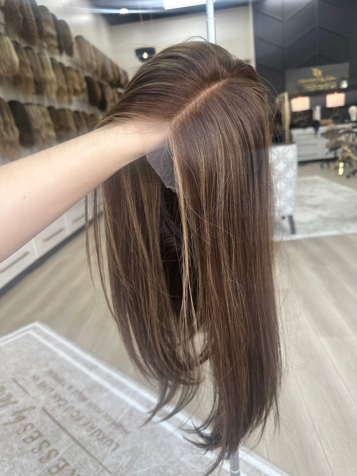 22-inch brown human hair wig with a Velvet Luxe base