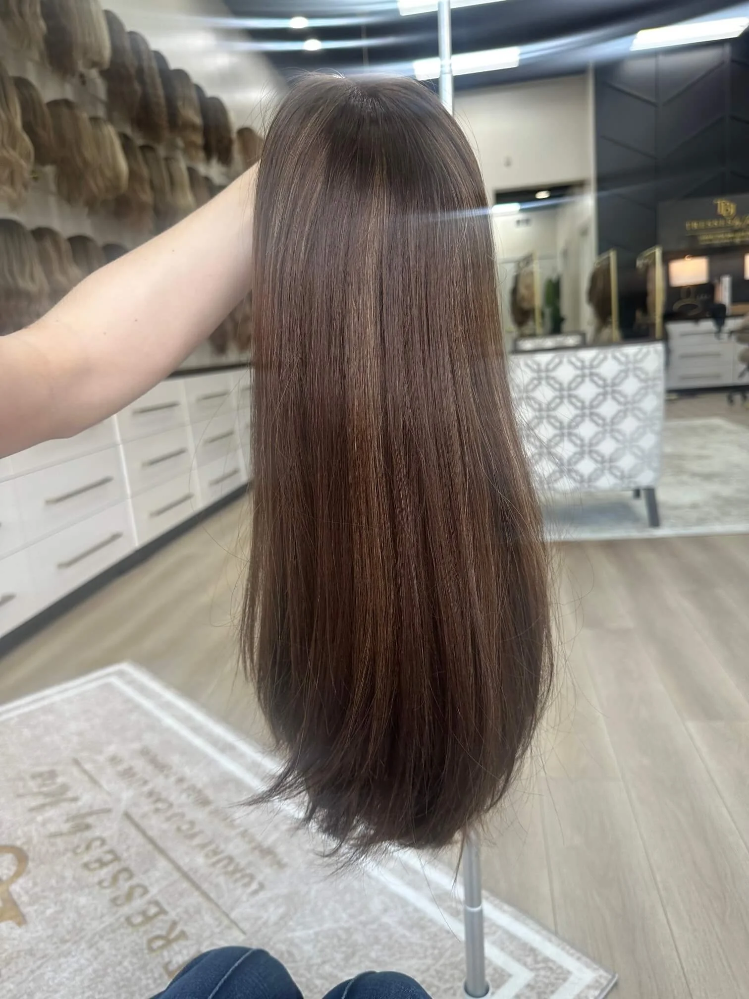22-inch brown human hair wig with a Velvet Luxe base