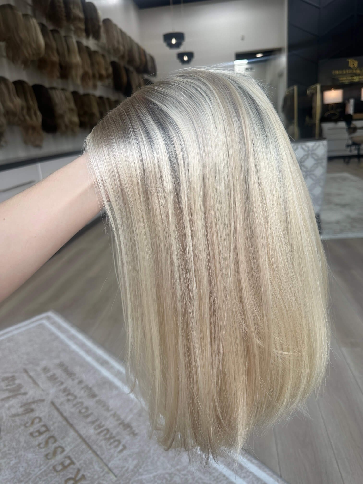 22-inch blonde human hair wig with a Velvet Luxe base