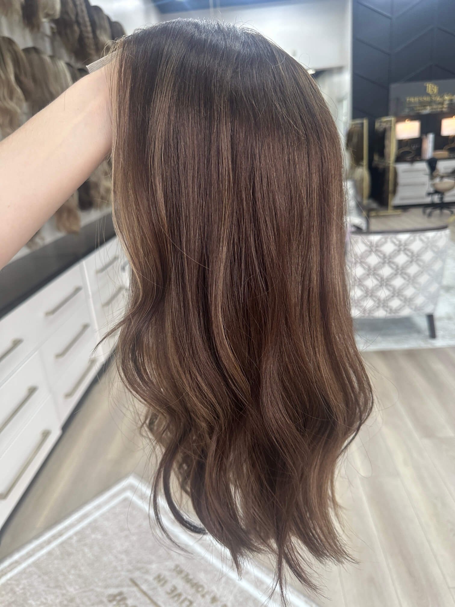 20-inch brown human hair wig with a Velvet Luxe base