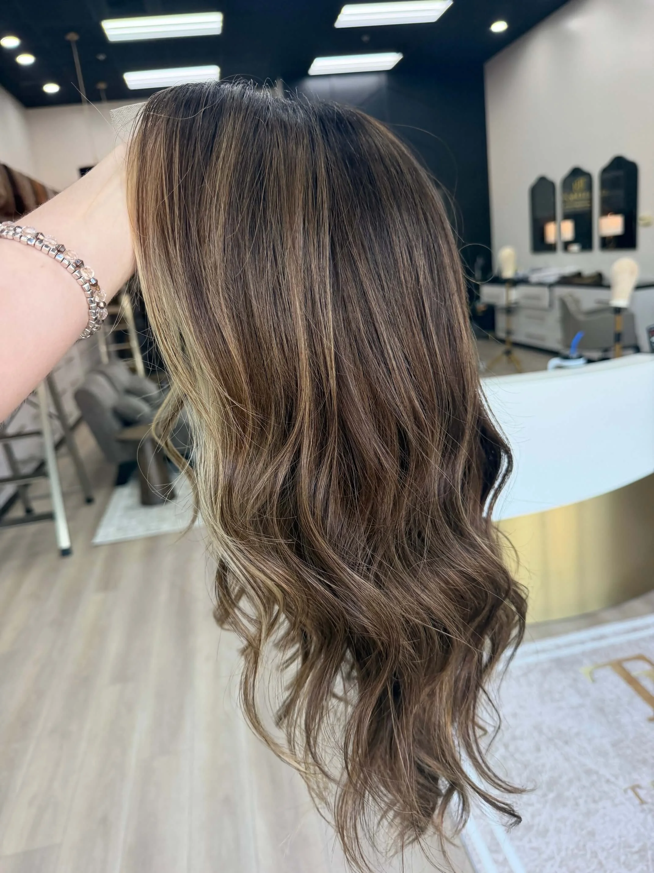 25-inch brown Slavic human hair wig with a Diamond Lace Top base