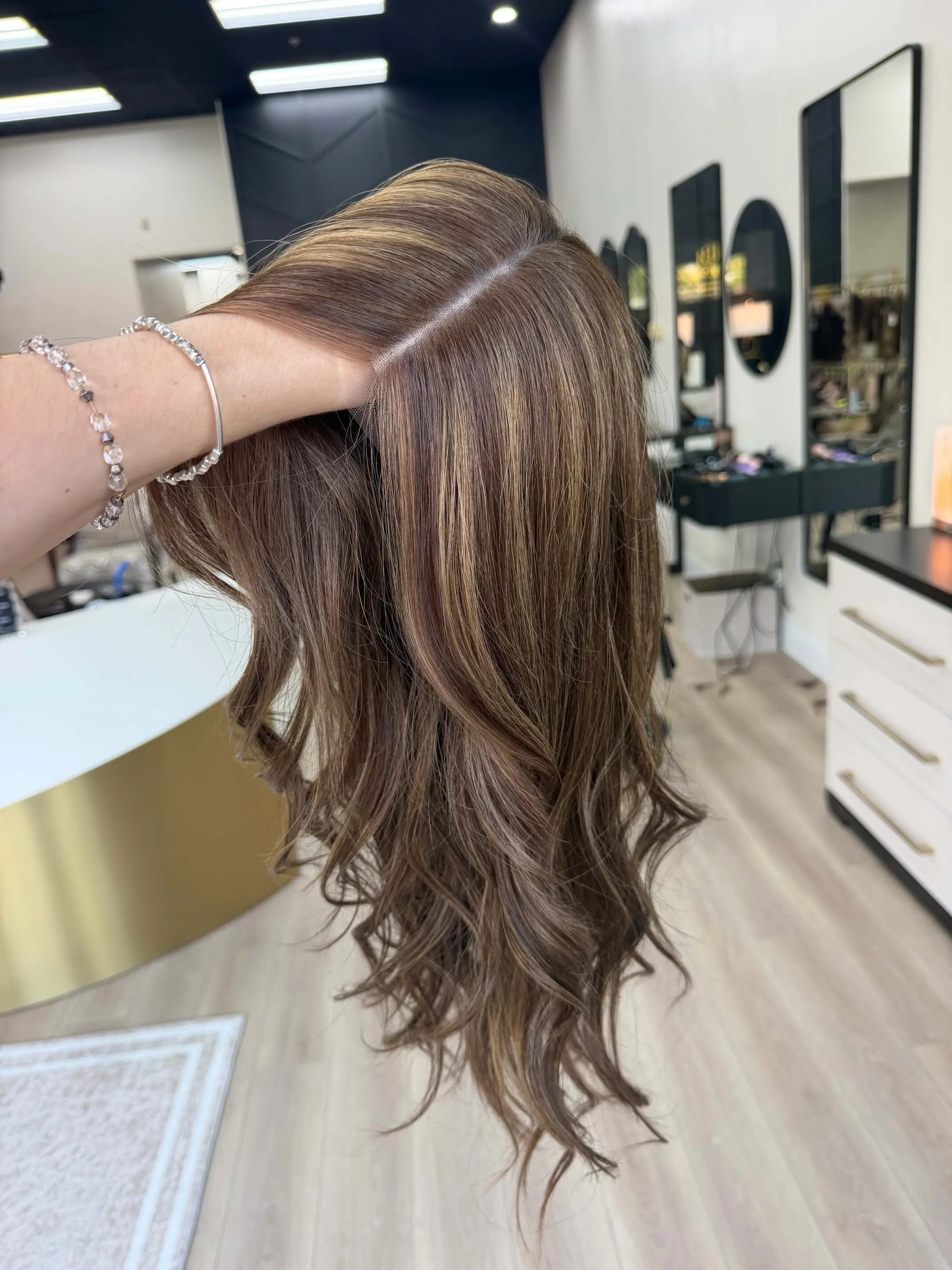 27-inch bronde Slavic human hair wig with a Diamond Lace Top base