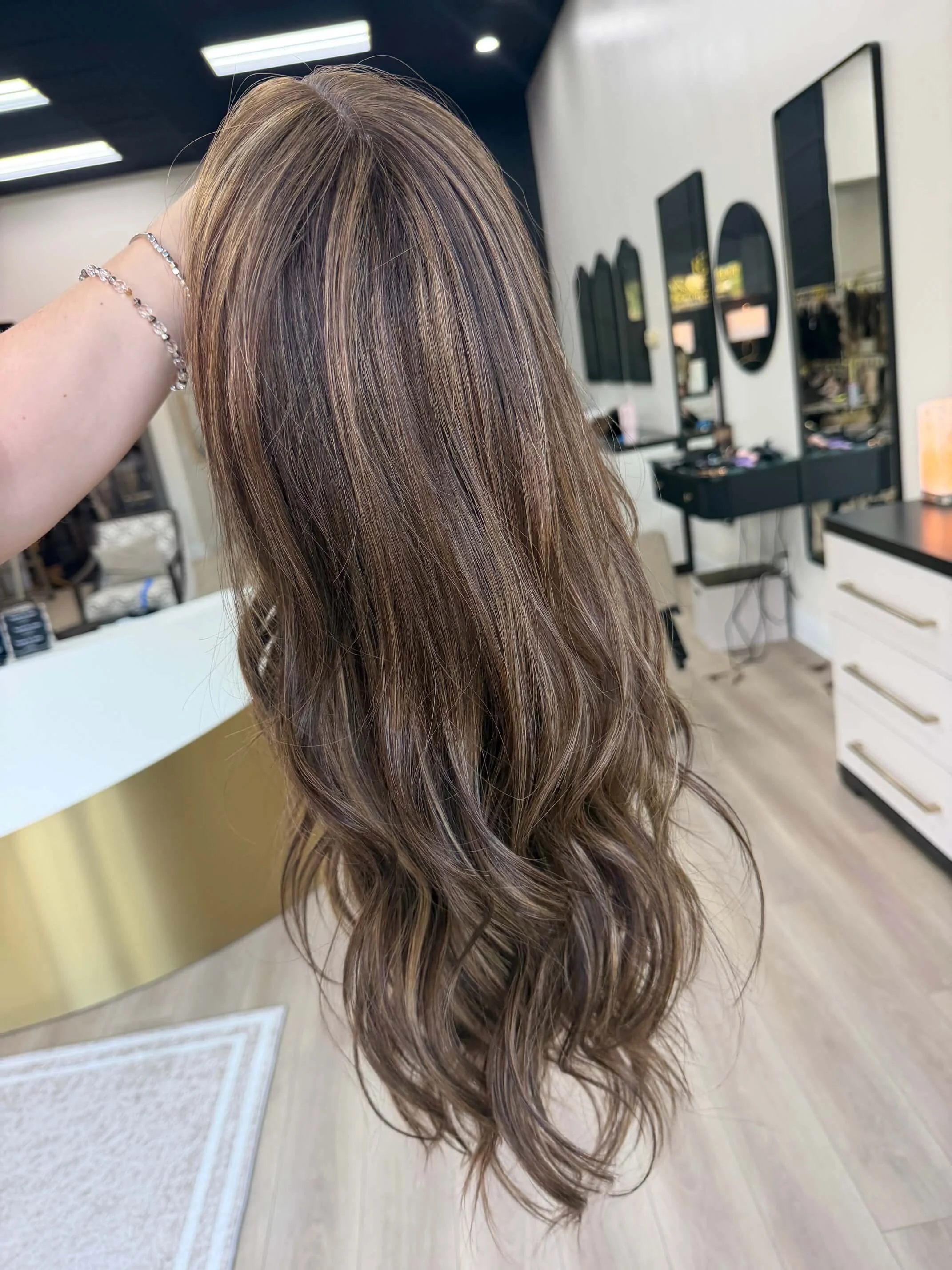 27-inch bronde Slavic human hair wig with a Diamond Lace Top base
