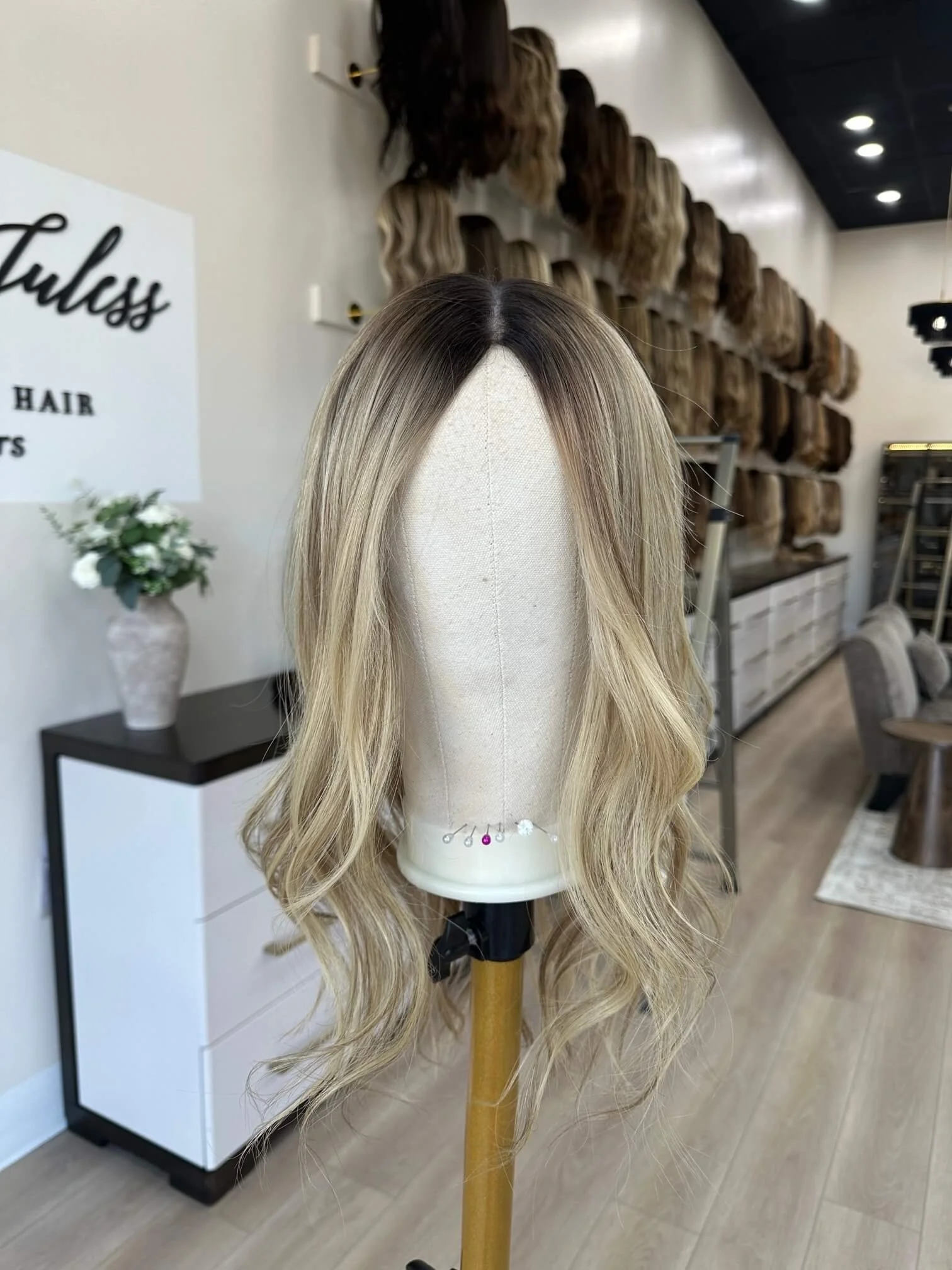 24-inch blonde Slavic human hair topper with a Diamond Lace Top base