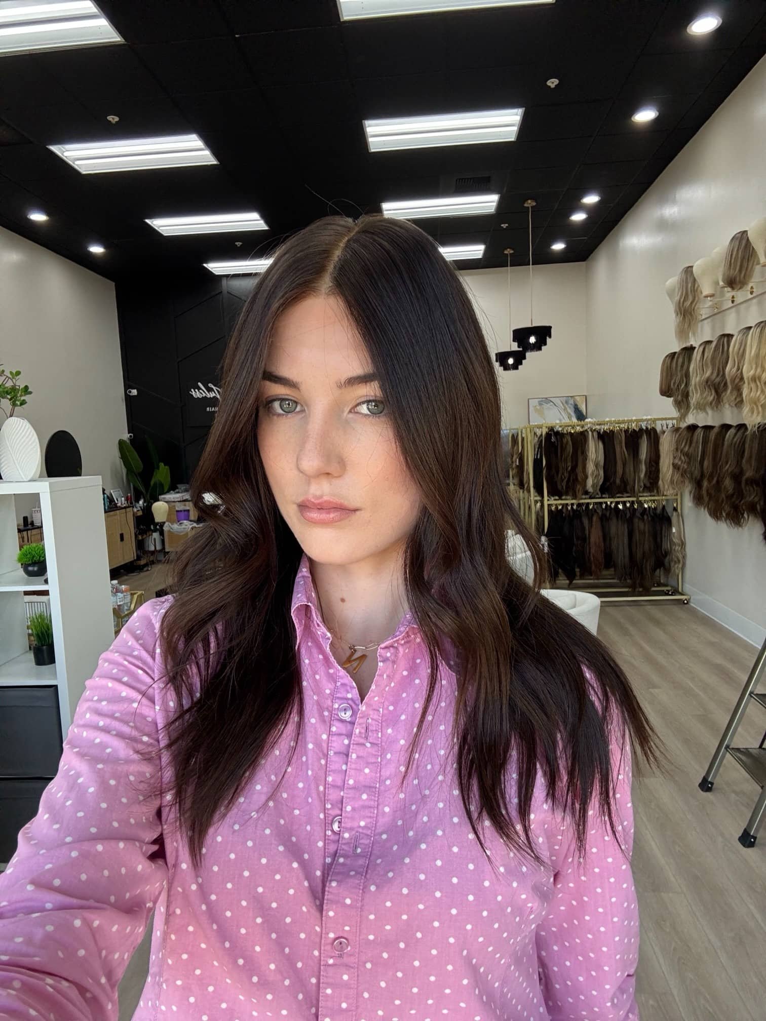 _Woman_wearing_a_jet_black_straight_wig_inside_Tresses_By_Juless_Studio__Davis__Sacramento___.jpg