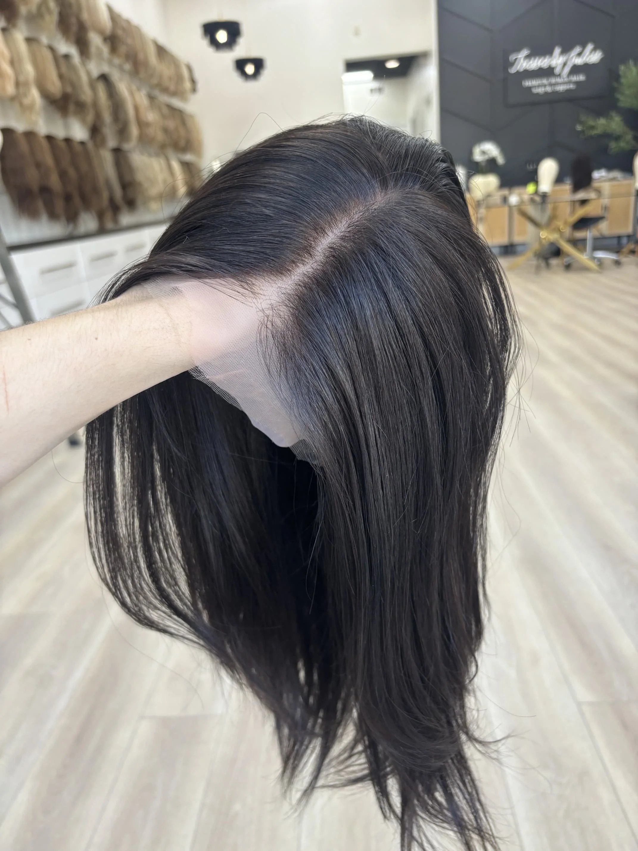 _Woman_wearing_a_jet_black_curly_wig_at_Tresses_By_Juless_Studio__Rancho_Cordova__Folsom___.jpg