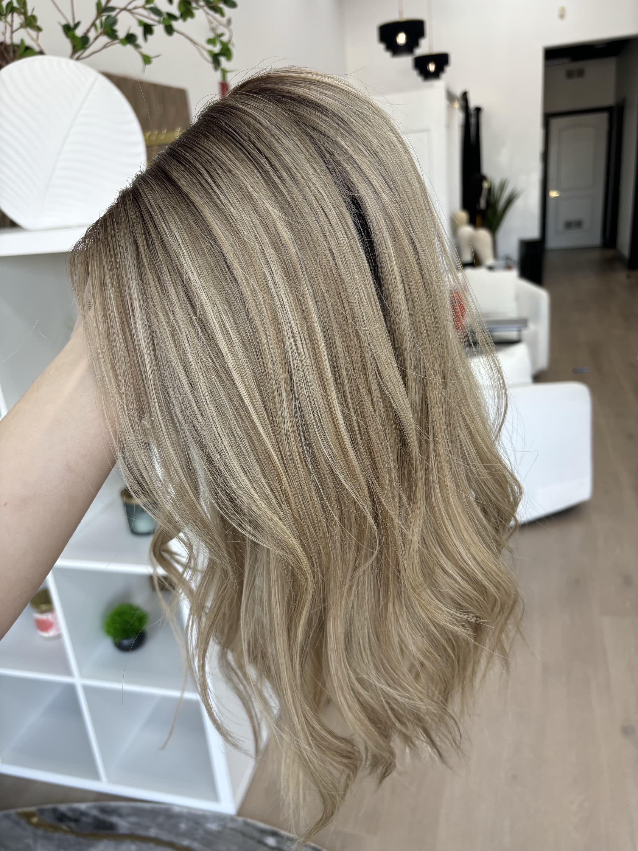_Curly_honey_blonde_wig_on_a_woman_at_Tresses_By_Juless_Studio__Folsom__California___.jpg