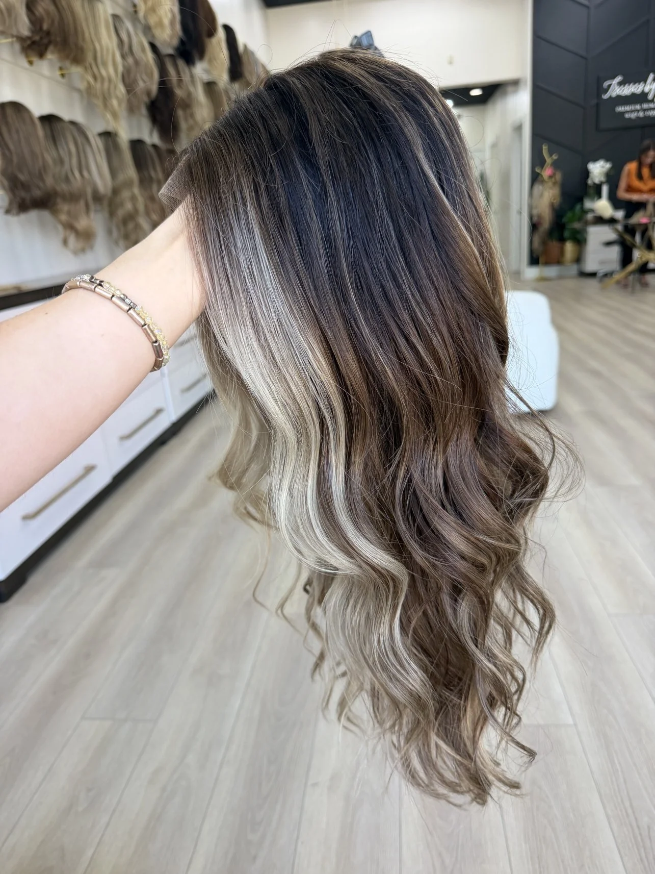 _Short_auburn_wavy_wig_styled_on_a_woman_at_Tresses_By_Juless_Studio__Folsom___.jpg