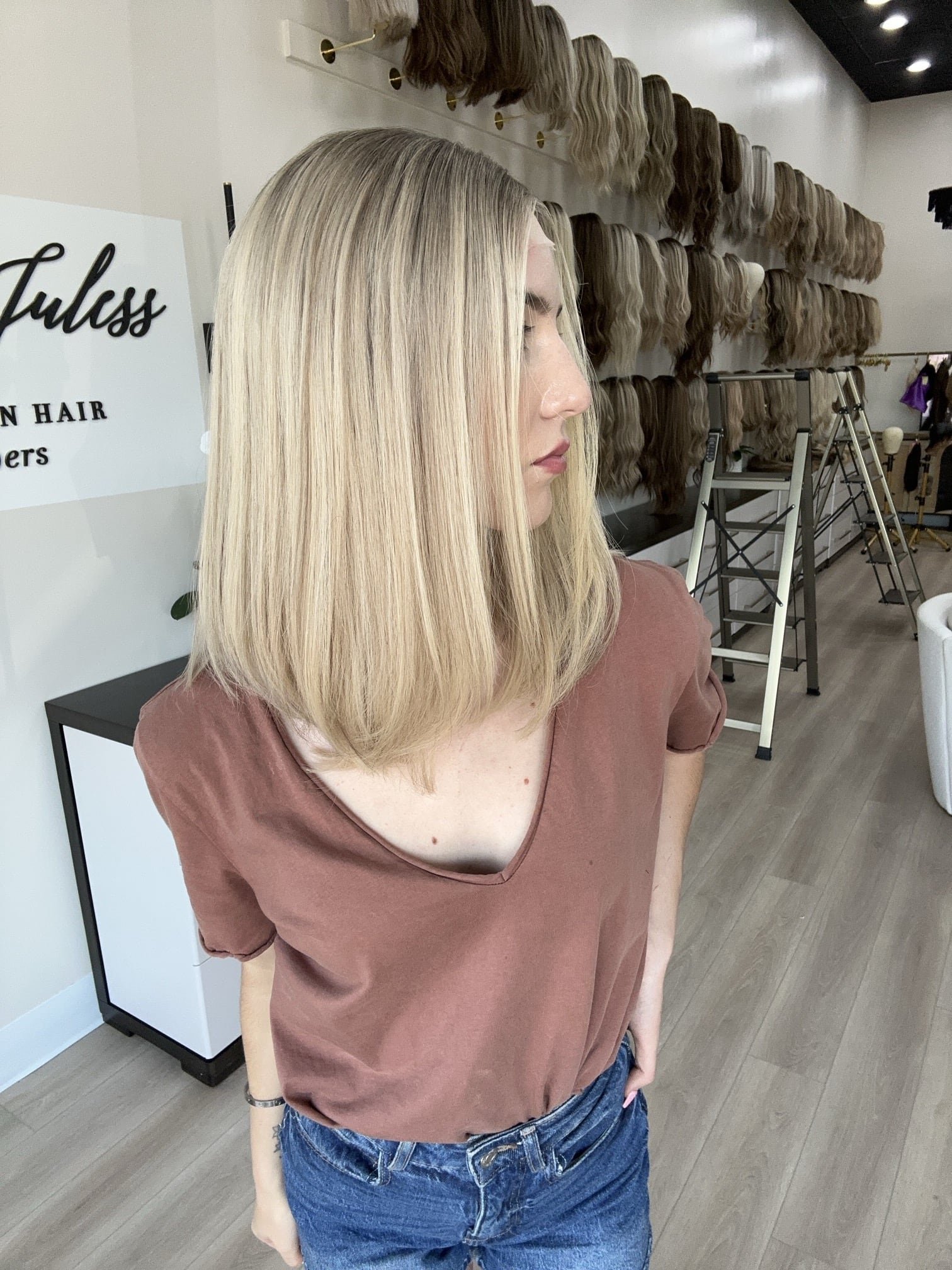 Brunette_human_hair_wig_with_caramel_highlights_worn_by_a_woman_in_Folsom_Studio__.jpg