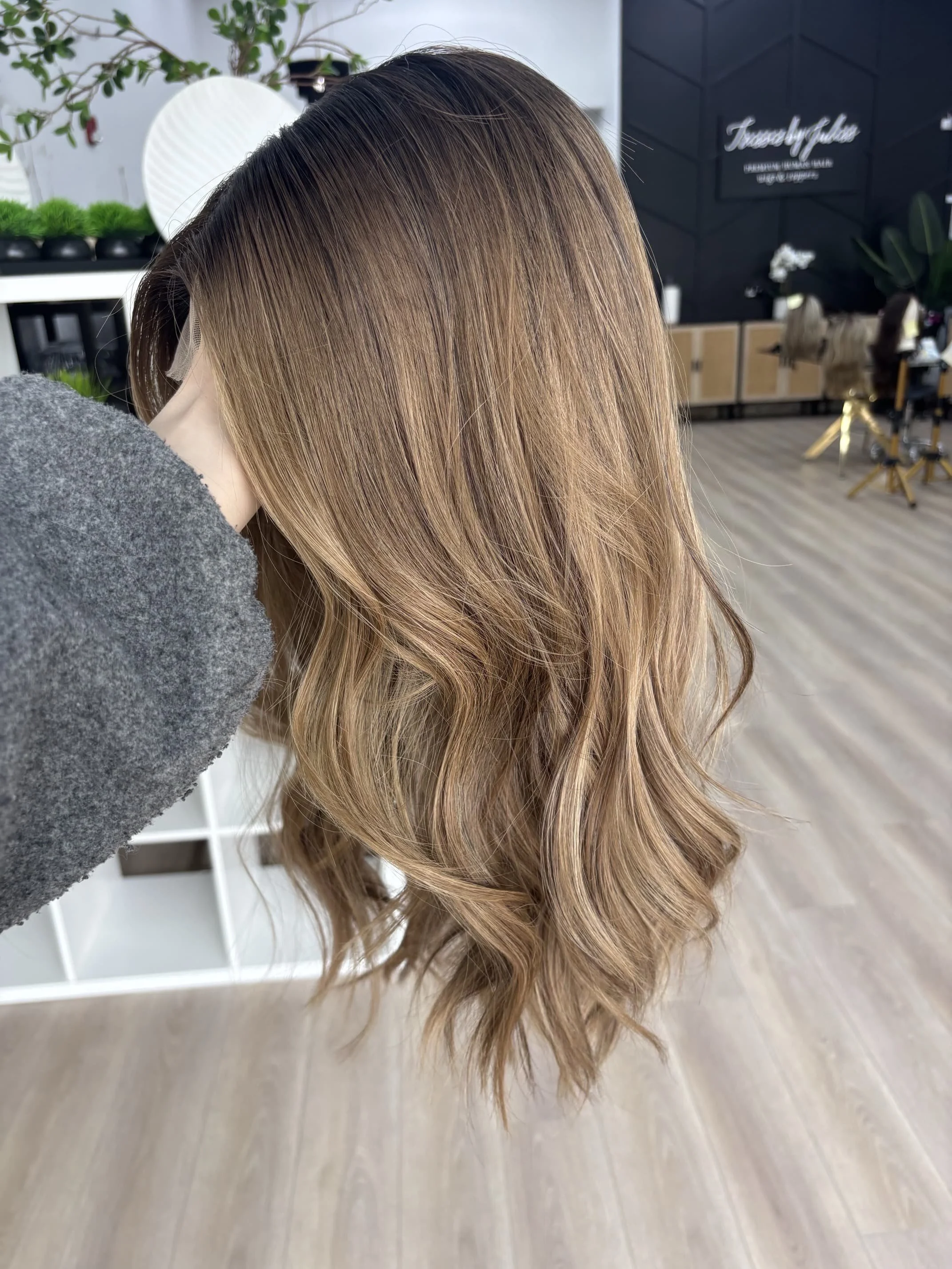 _Elegant_blonde_bob_wig_worn_by_a_woman_at_Tresses_By_Juless_Studio__Sacramento___.jpg