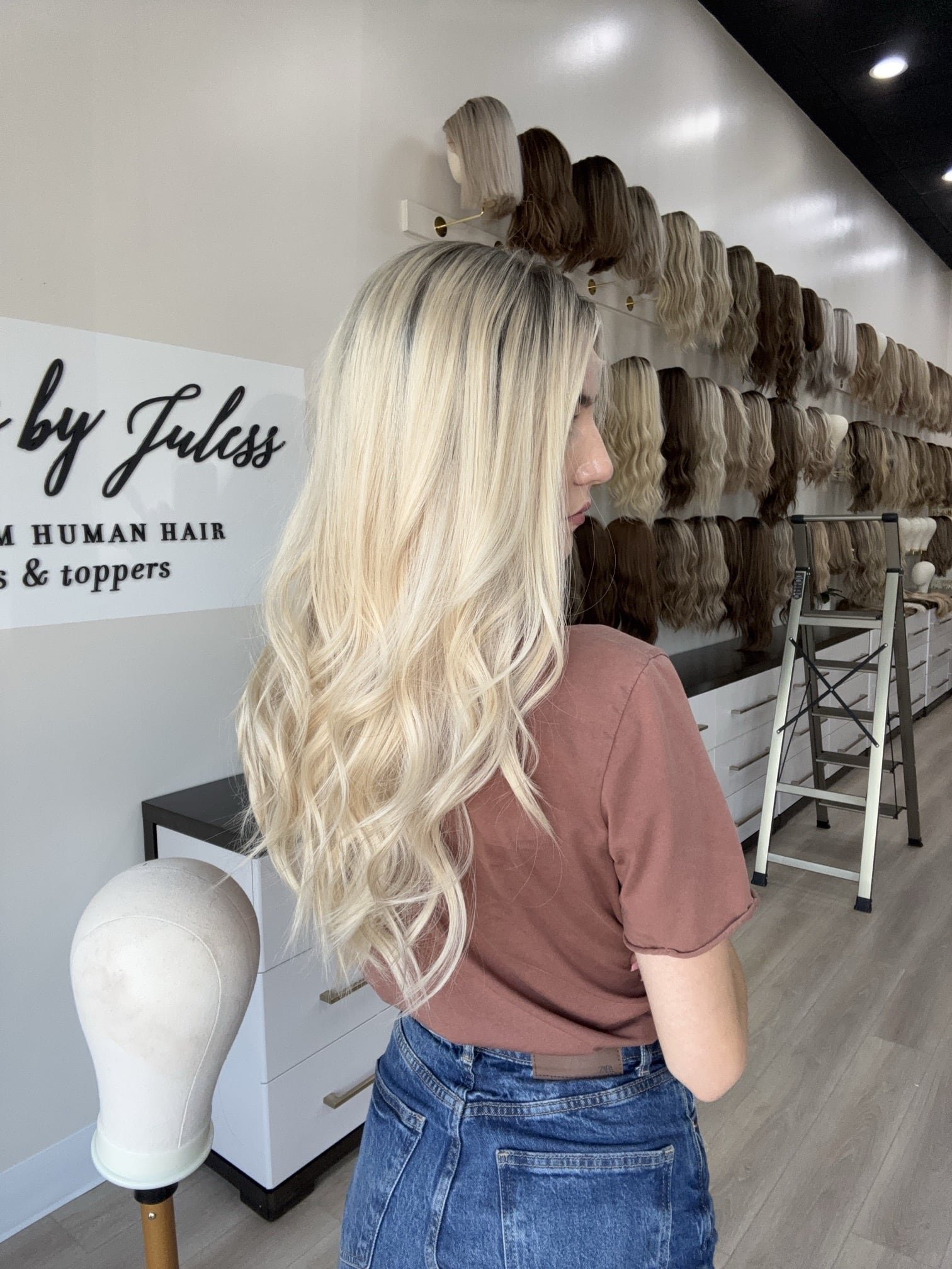 _Elegant_brunette_wig_with_natural_highlights__styled_on_a_woman_in_Sacramento_Studio___.jpg