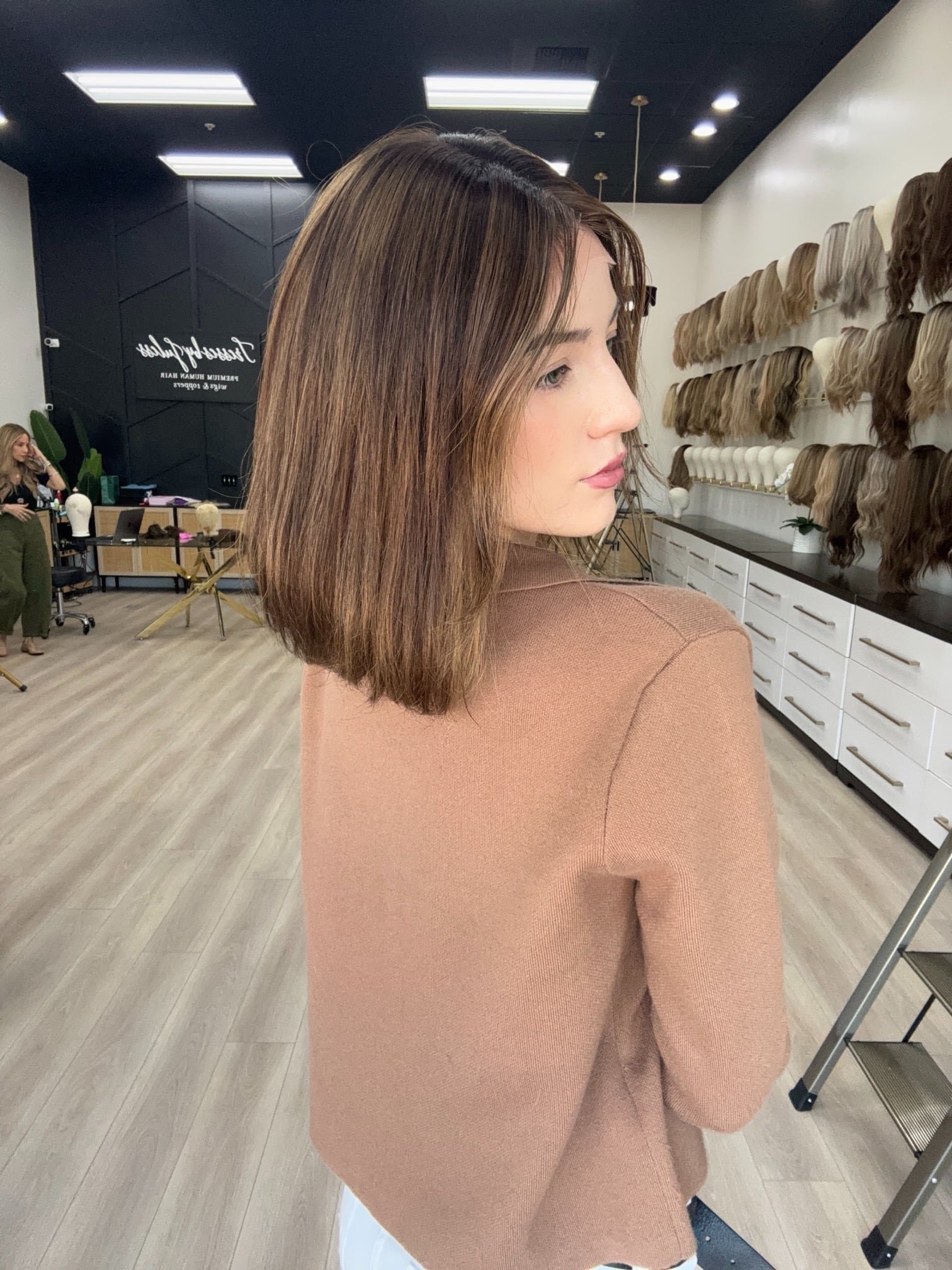 Elegant_dark_brown_human_hair_wig_worn_by_a_woman_in_Sacramento_Studio__.jpg