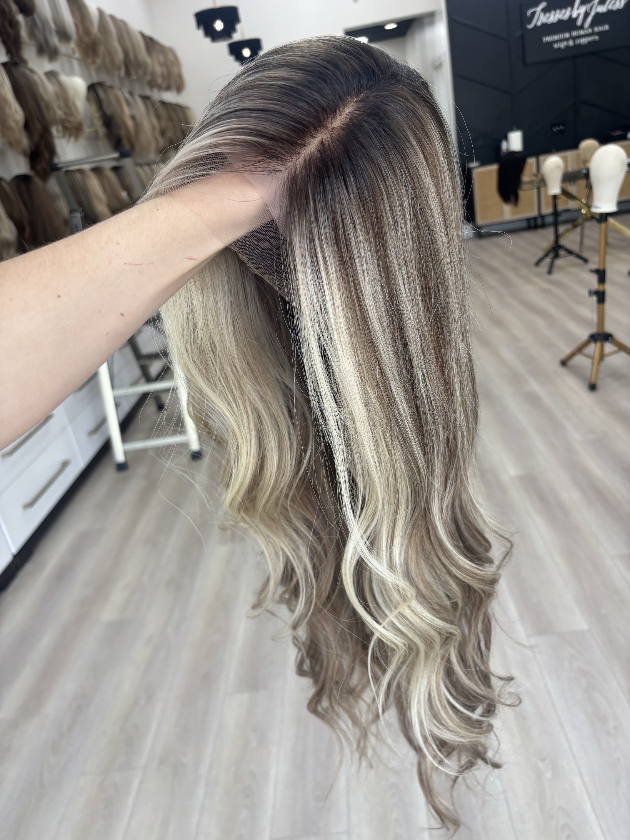 _Woman_wearing_a_jet_black_straight_wig_inside_Tresses_By_Juless_Studio__Sacramento___.jpg