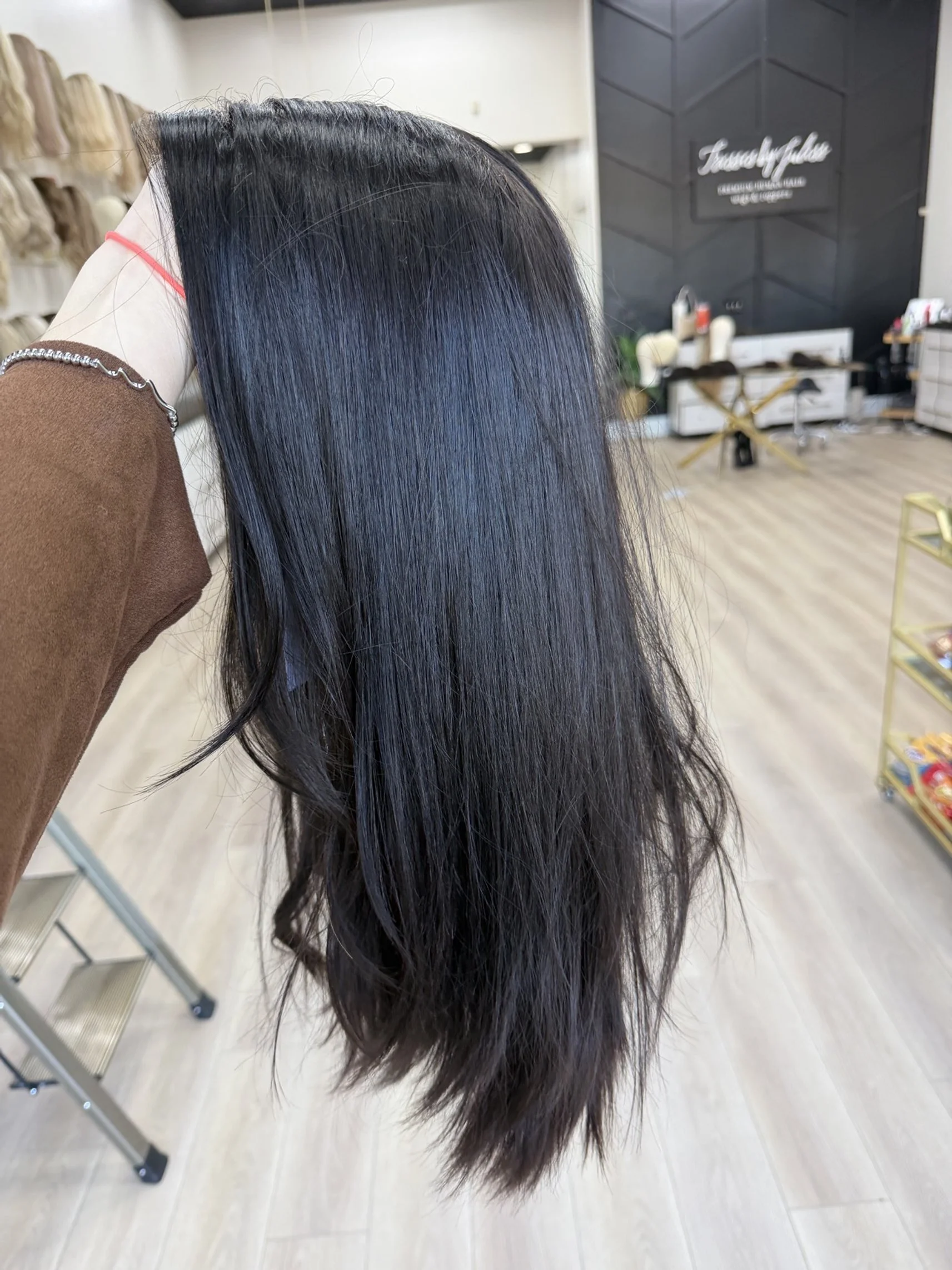 _Woman_wearing_a_jet_black_straight_wig_inside_Tresses_By_Juless_Studio__Sacramento___.jpg