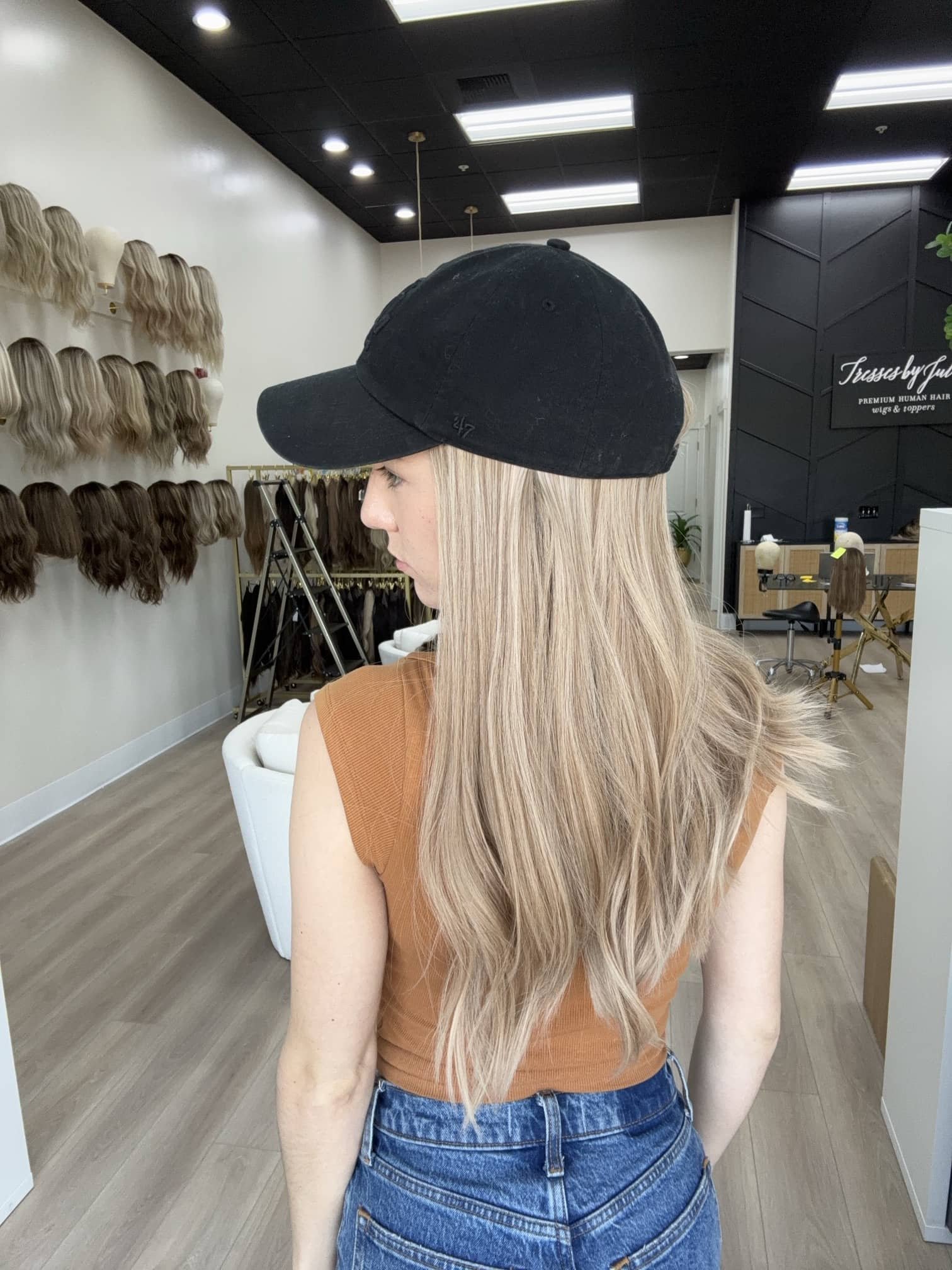_Deep_red_wavy_wig_worn_by_a_woman_inside_Tresses_By_Juless_Studio__Citrus_Heights__Folsom___.jpg