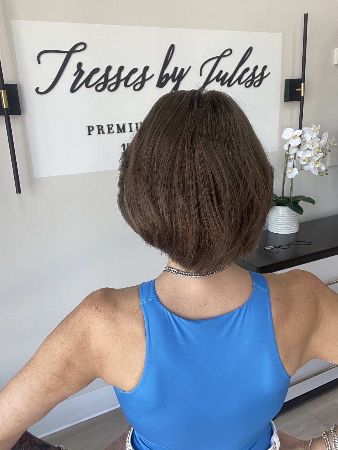 _Woman_wearing_a_jet_black_curly_wig_at_Tresses_By_Juless_Studio__Folsom___.jpg