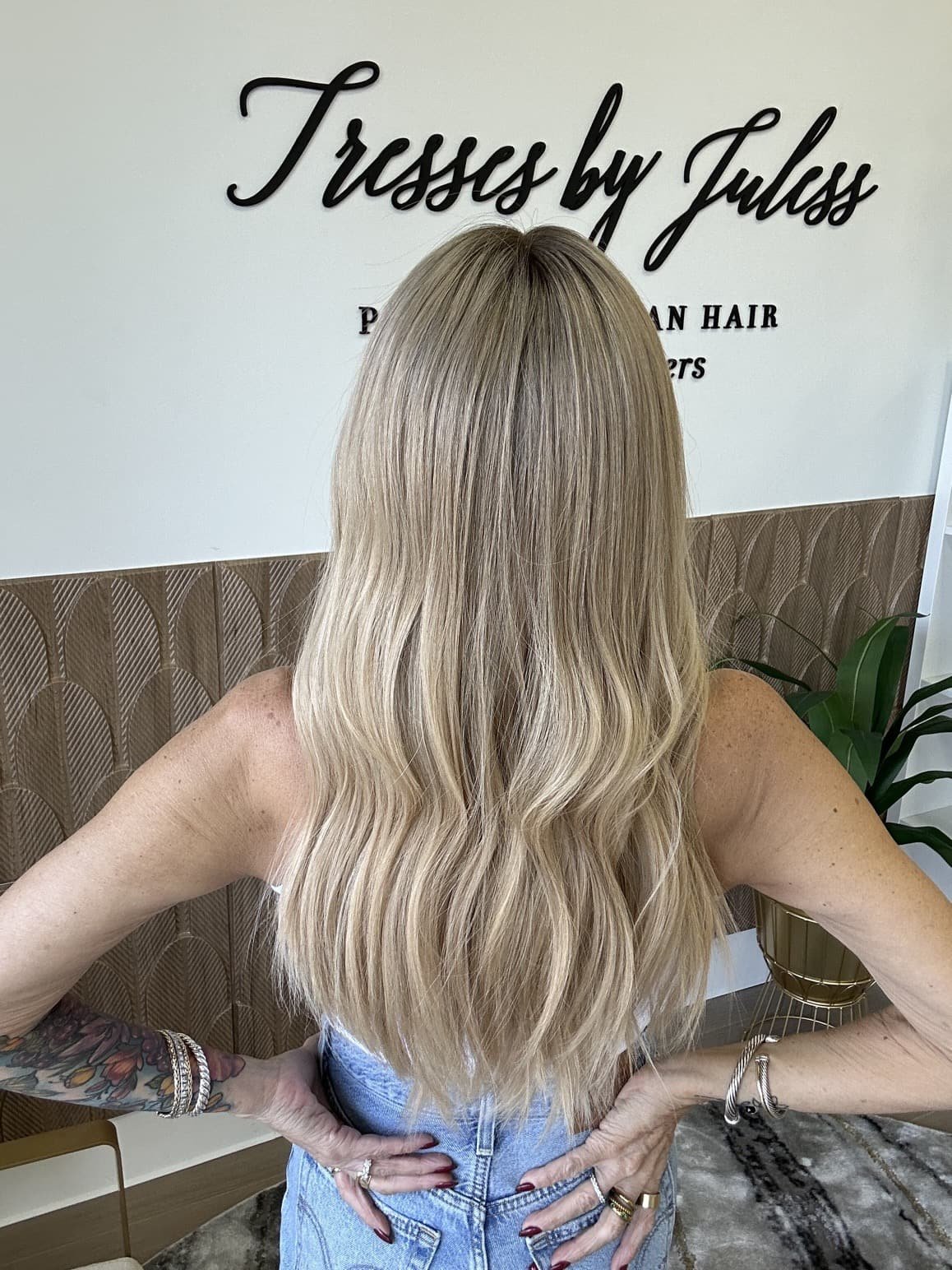 _Deep_red_wavy_wig_worn_by_a_woman_inside_Tresses_By_Juless_Studio__Folsom___.jpg