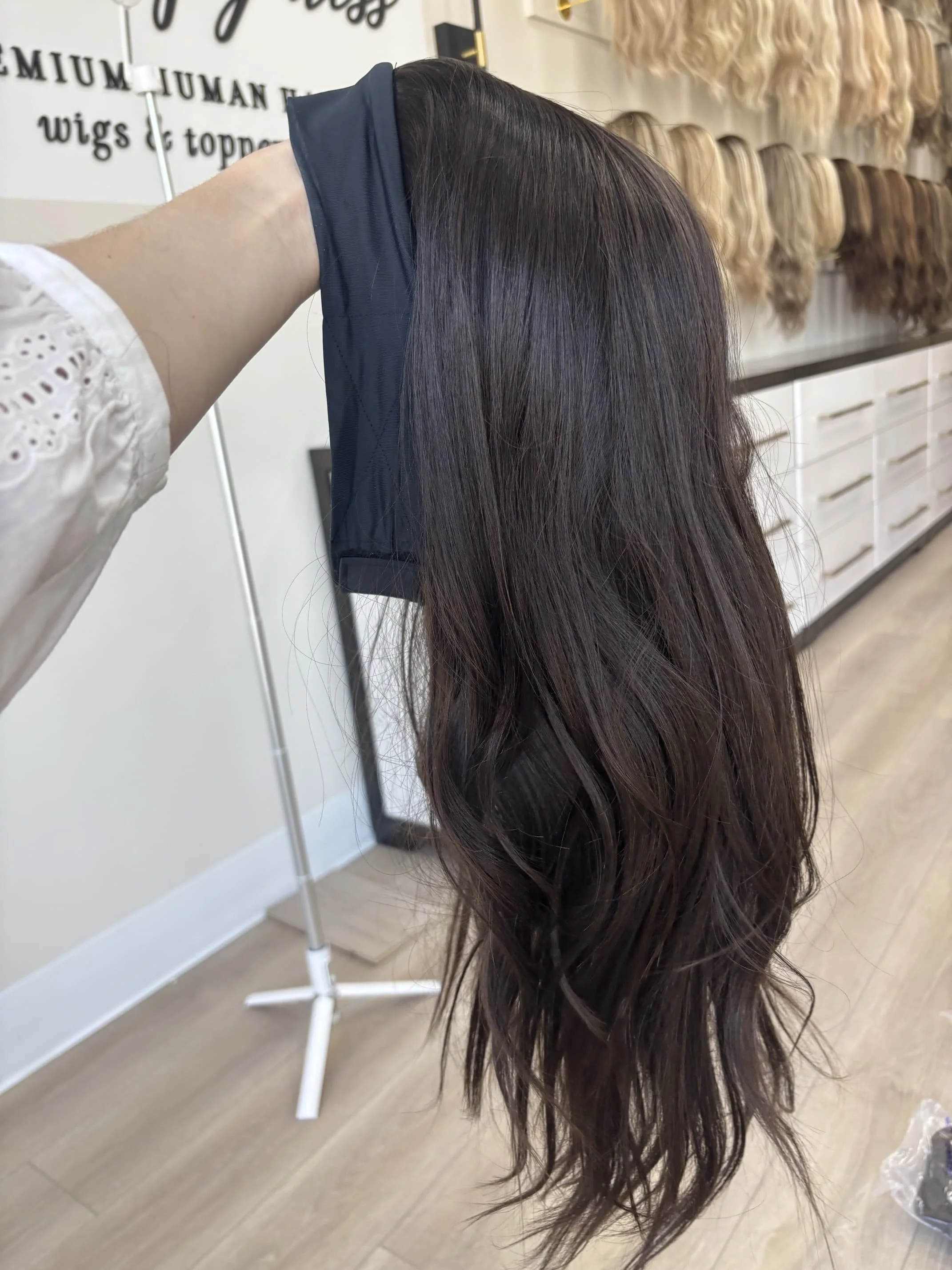_Deep_red_wavy_wig_worn_by_a_woman_inside_Tresses_By_Juless_Studio__Citrus_Heights__Folsom___.jpg