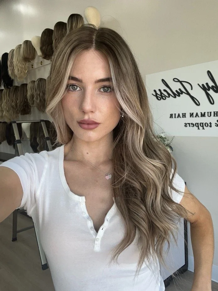 Brunette_human_hair_wig_with_caramel_highlights_worn_by_a_woman_in_Folsom_Studio__.jpg