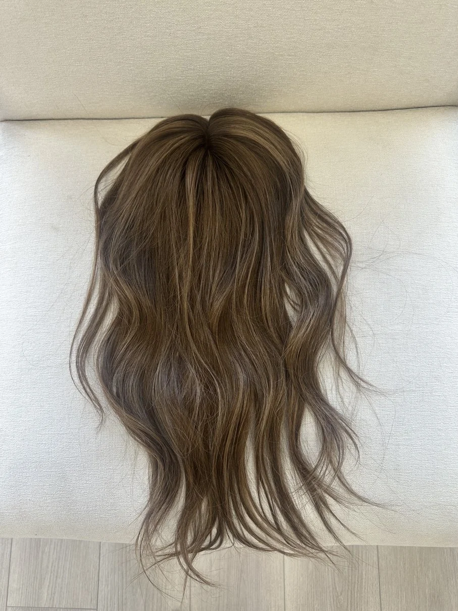 _Middle_aged_woman_wearing_a_custom_colored_blonde_bob_wig_in_Folsom__California___.jpg