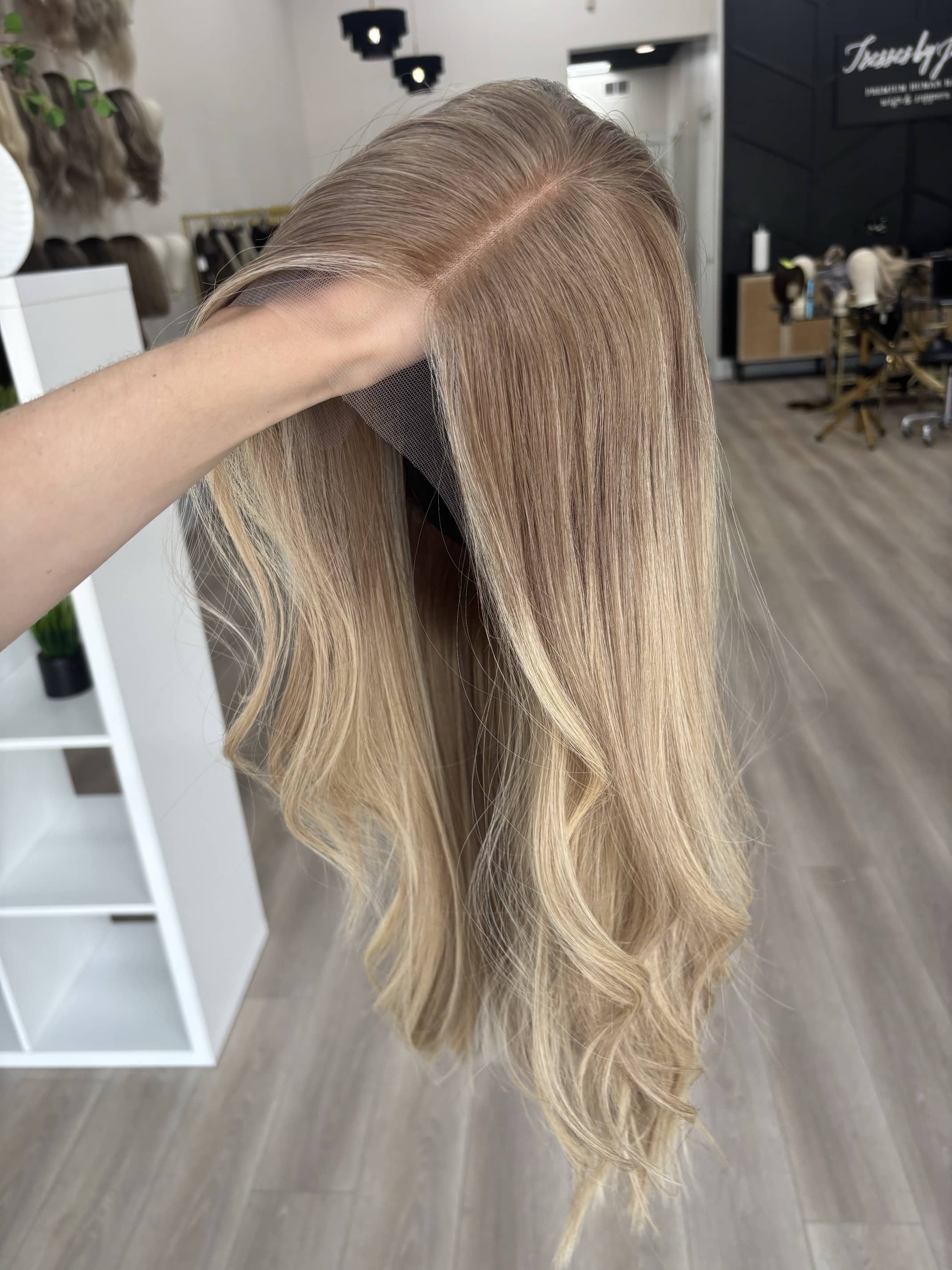 _Woman_wearing_a_jet_black_straight_wig_inside_Tresses_By_Juless_Studio__Davis__Sacramento___.jpg