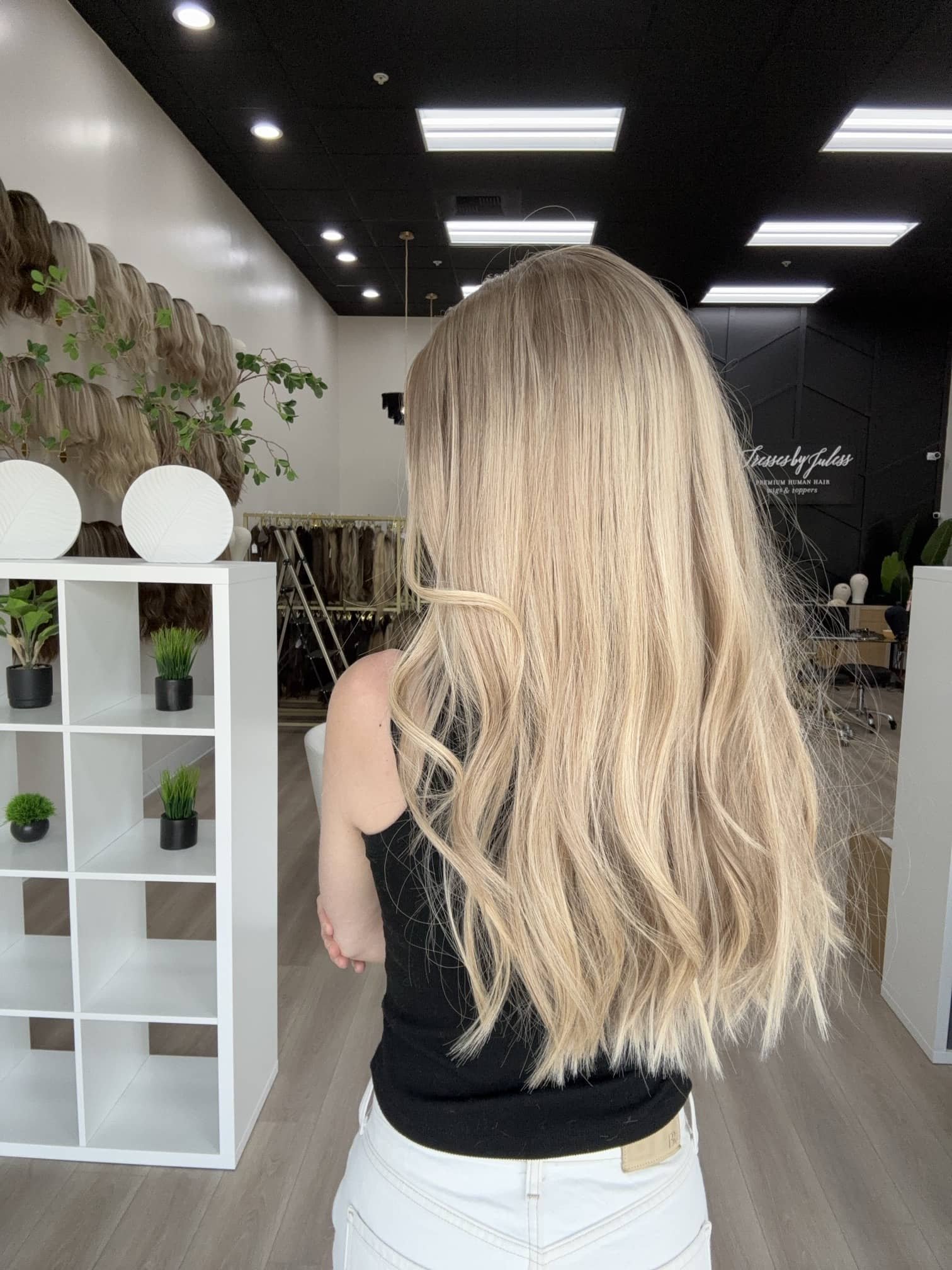 Brunette_human_hair_wig_with_caramel_highlights_worn_by_a_woman_in_Folsom_Studio__.jpg
