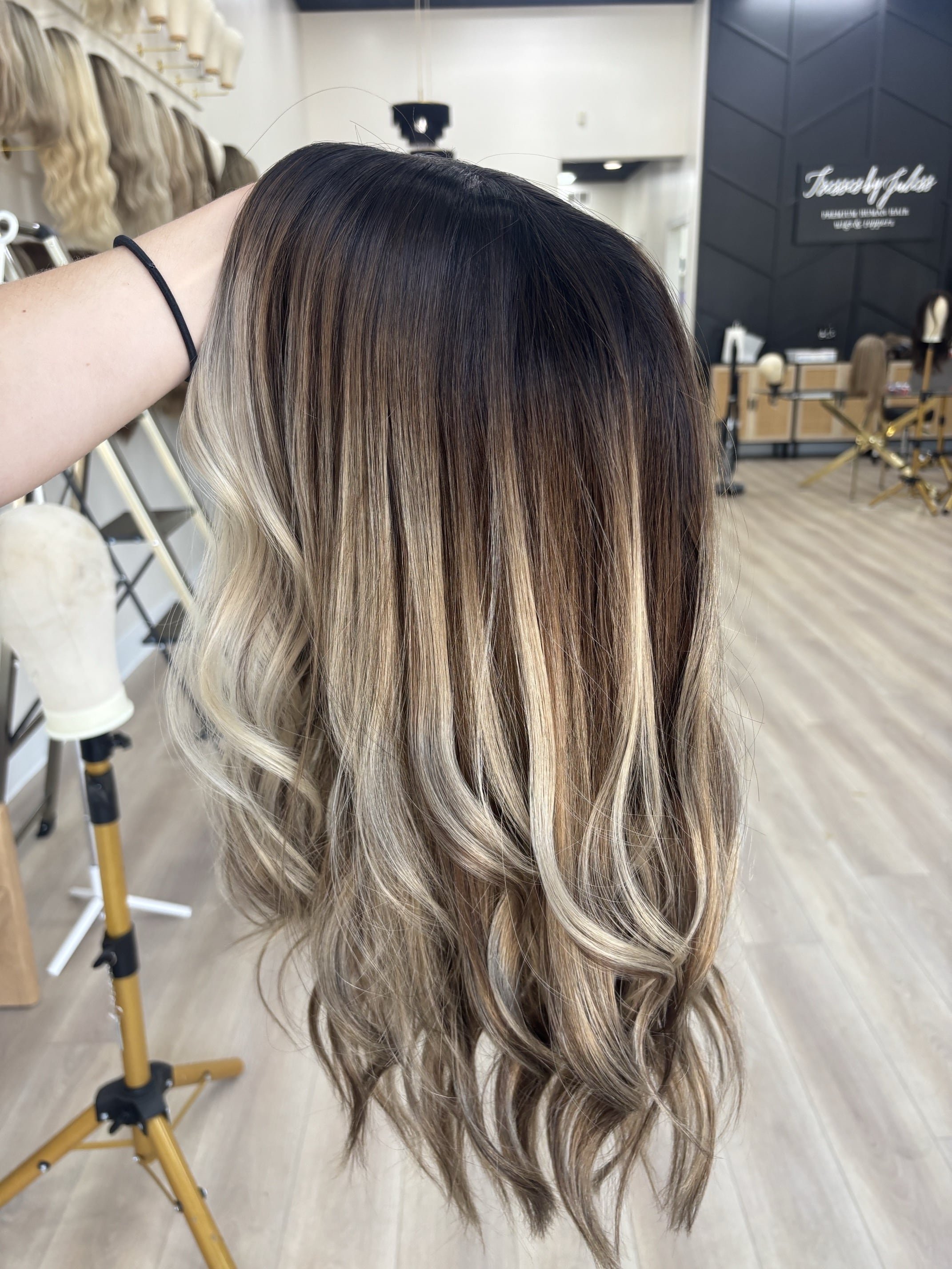 _Long_wavy_chestnut_brown_wig_styled_on_a_woman_at_Tresses_By_Juless_Studio__Lincoln__Sacramento___.jpg