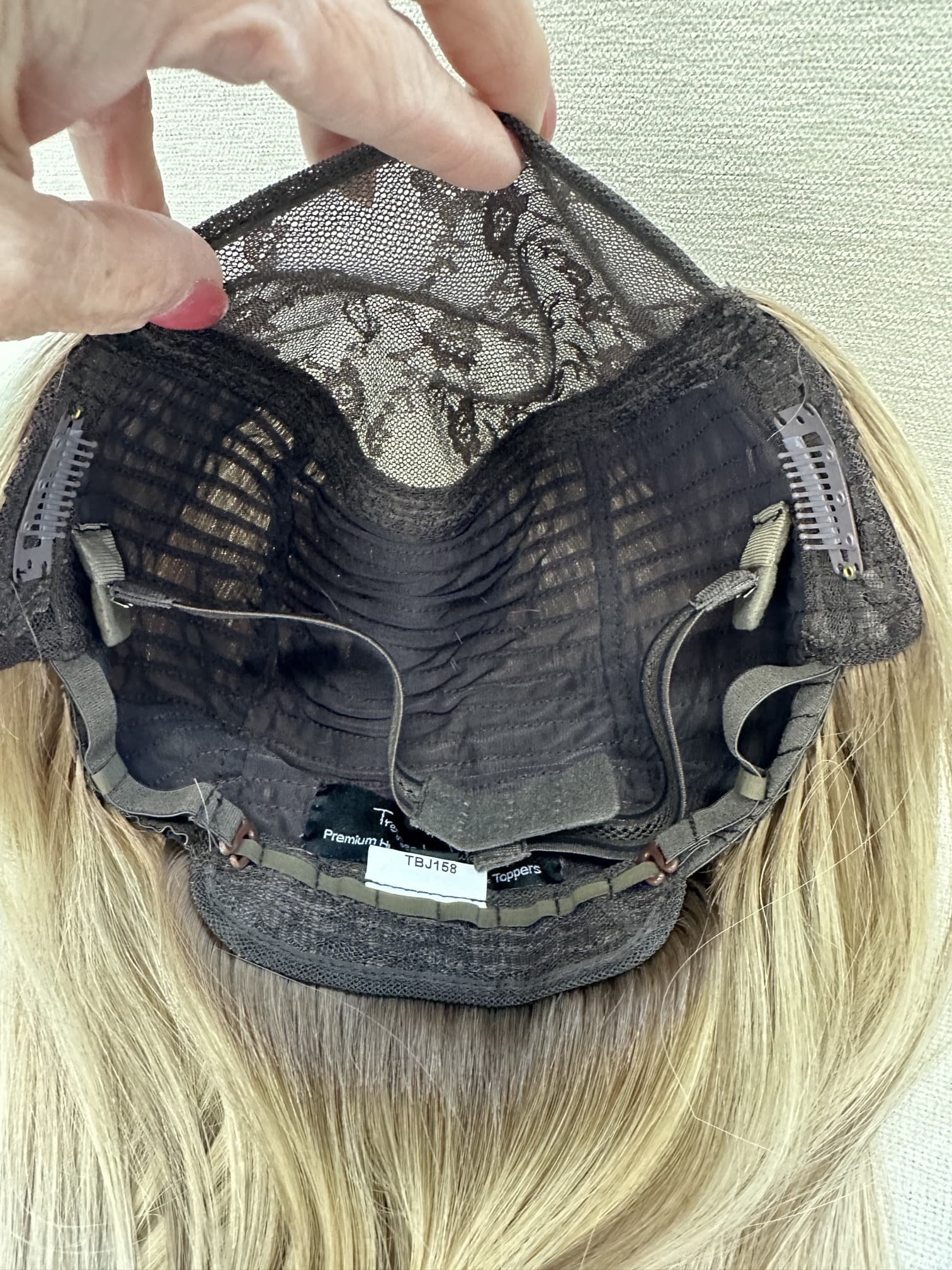 _Middle_aged_woman_with_a_chocolate_brown_wig_in_the_studio__Folsom__CA___.jpg