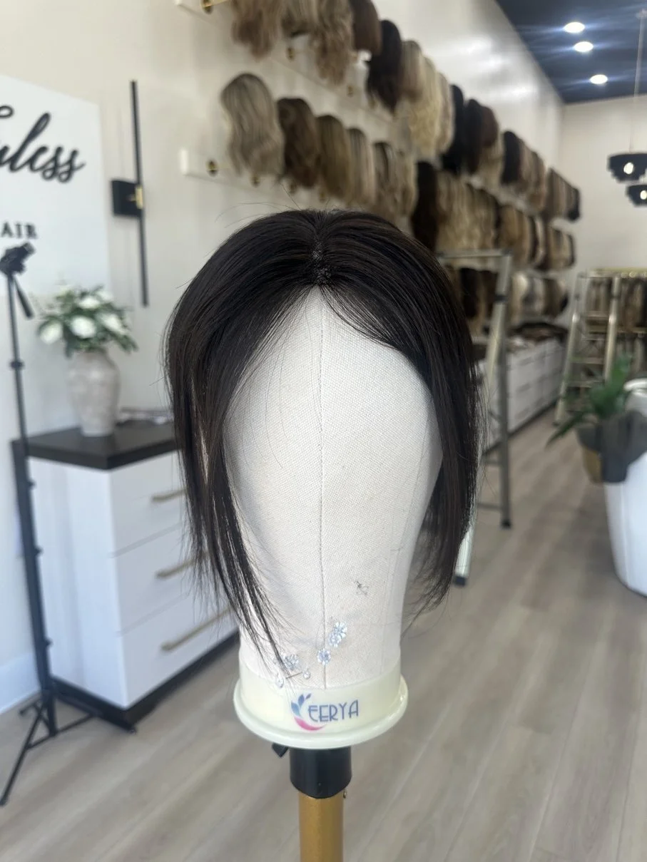 _Curly_jet_black_wig_styled_on_a_woman_at_Tresses_By_Juless_Studio__Fair_Oaks__Sacramento___.jpg