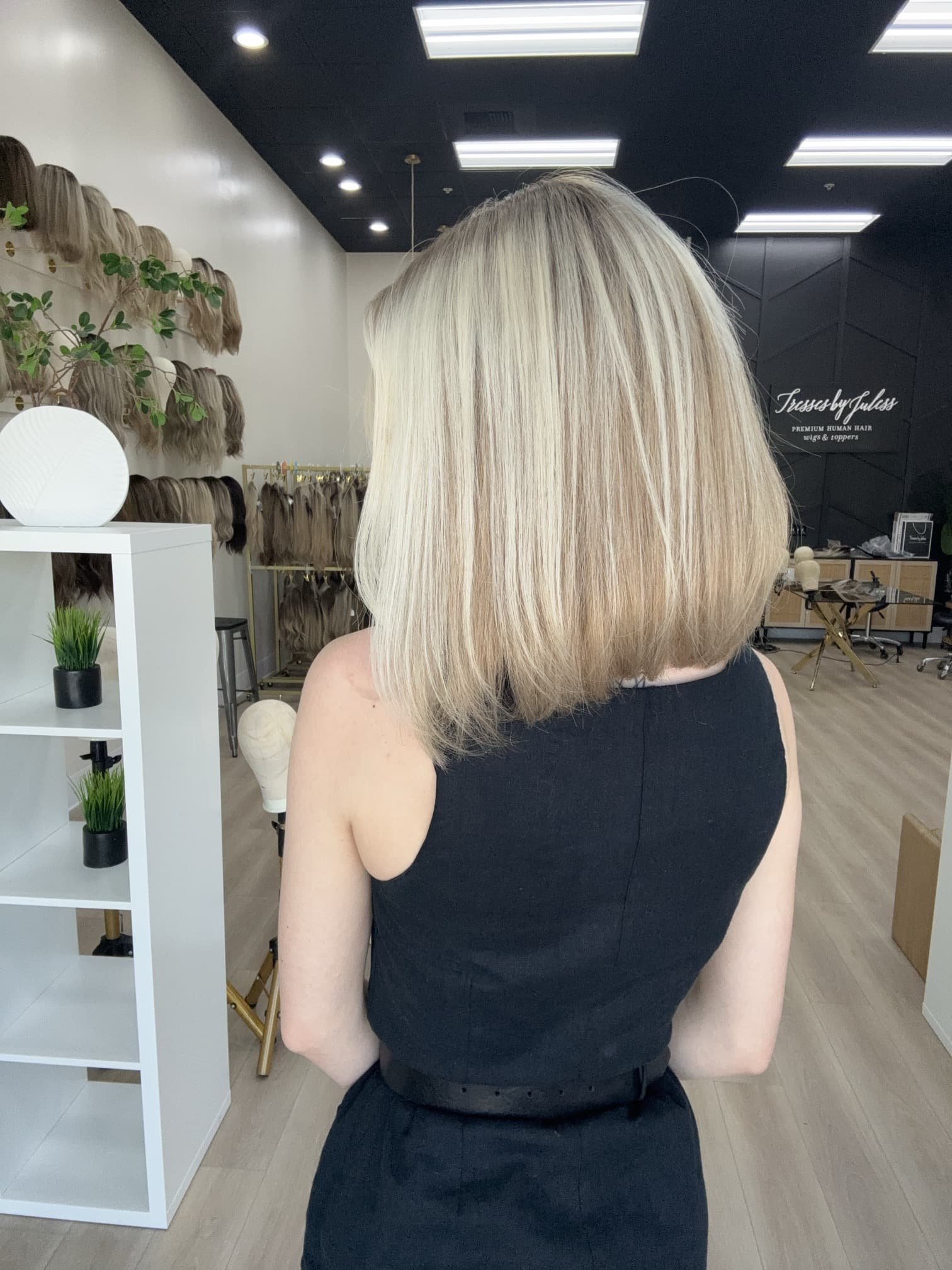 _Curly_jet_black_wig_styled_on_a_woman_at_Tresses_By_Juless_Studio__Sacramento___.jpg