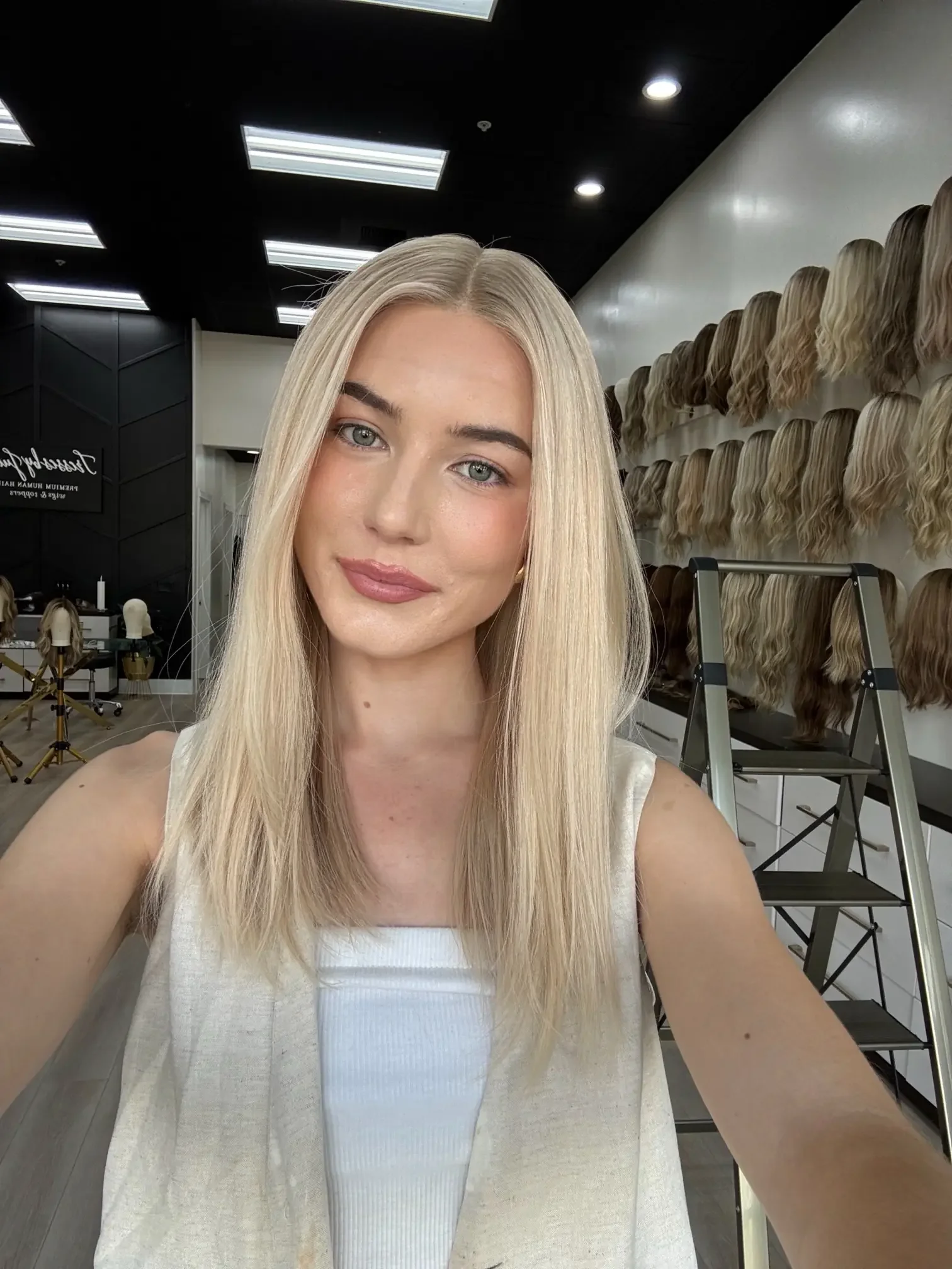 _Middle_aged_woman_wearing_a_custom_colored_blonde_bob_wig_in_Folsom__California___.webp