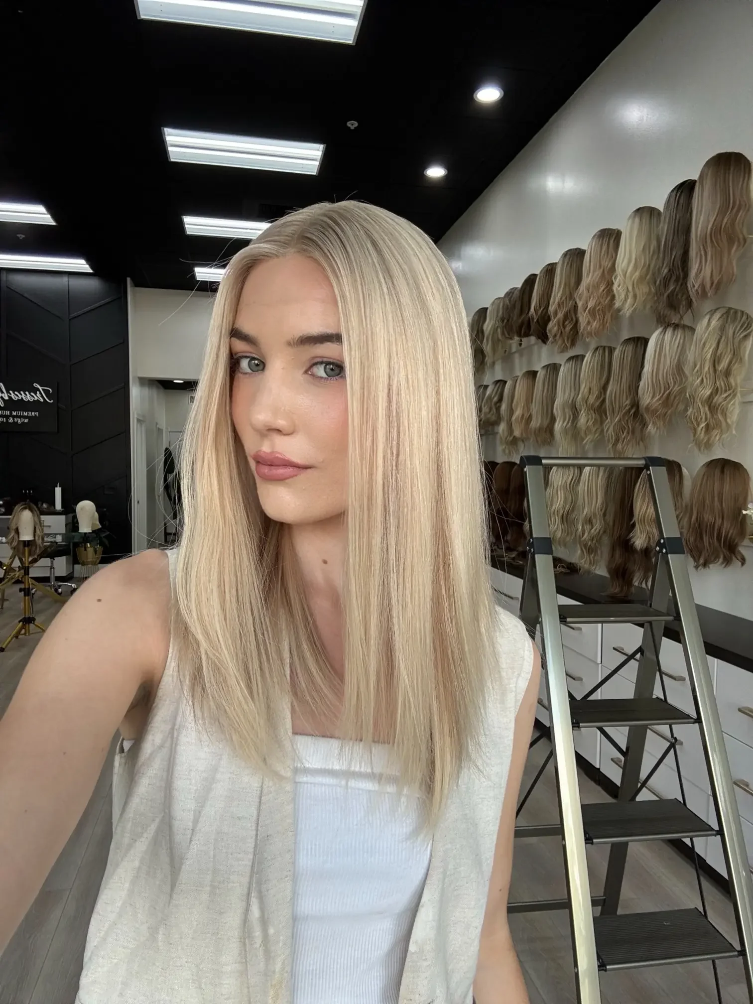 Elegant_dark_brown_human_hair_wig_worn_by_a_woman_in_Sacramento_Studio__.webp