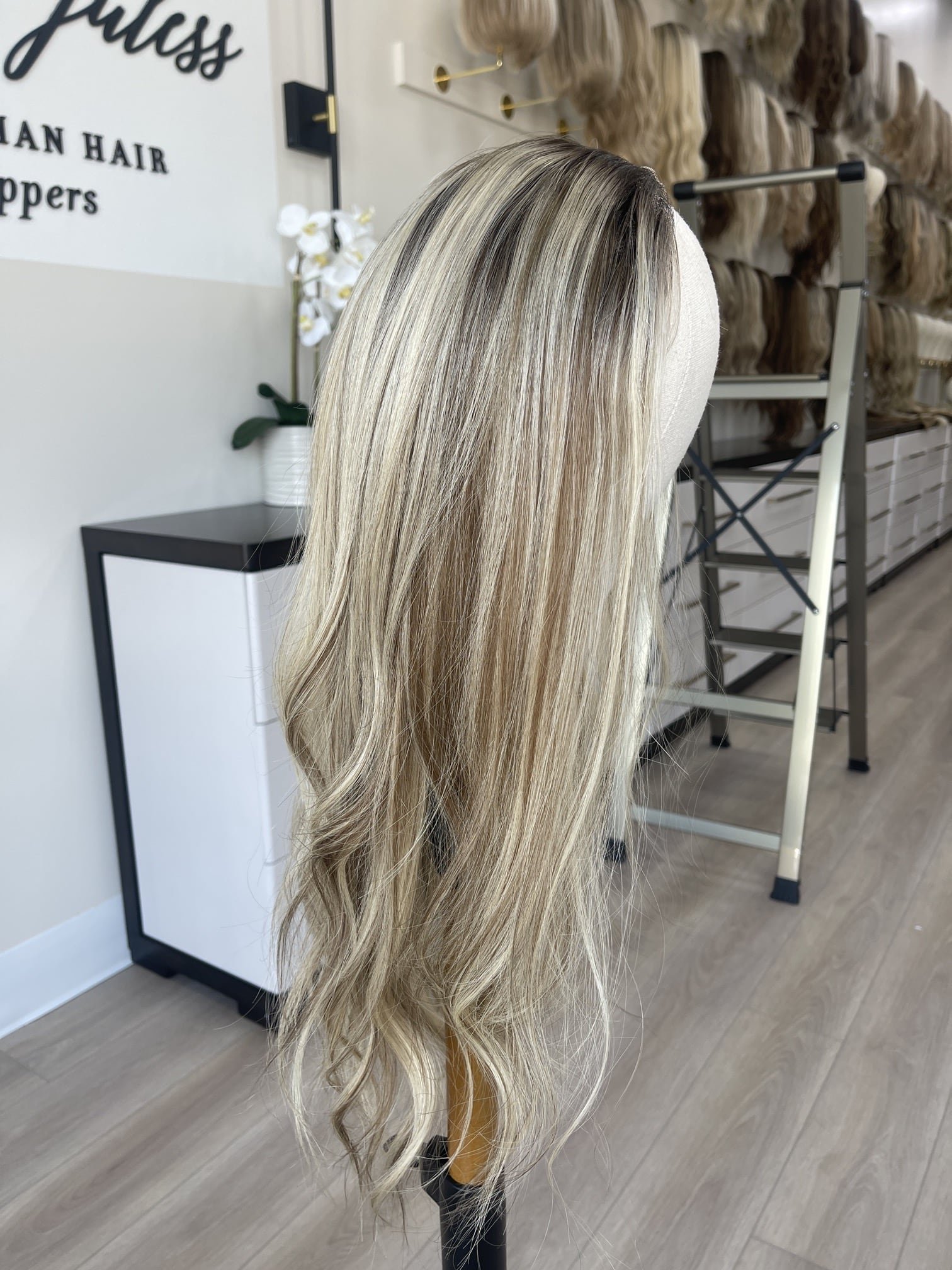 _Elegant_blonde_bob_wig_worn_by_a_woman_at_Tresses_By_Juless_Studio__Sacramento___.jpg