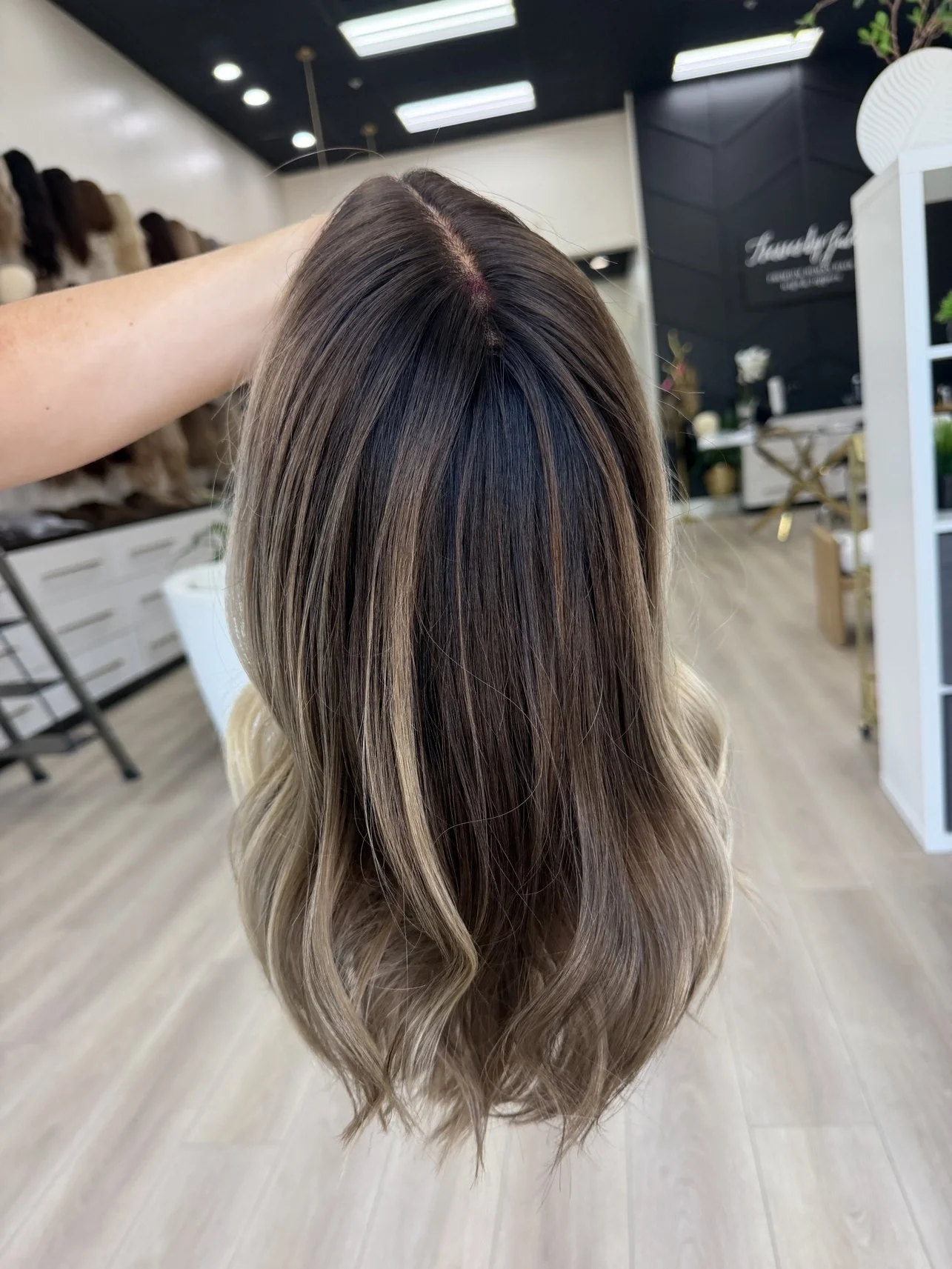 Elegant_dark_brown_human_hair_wig_worn_by_a_woman_in_Sacramento_Studio__.jpg