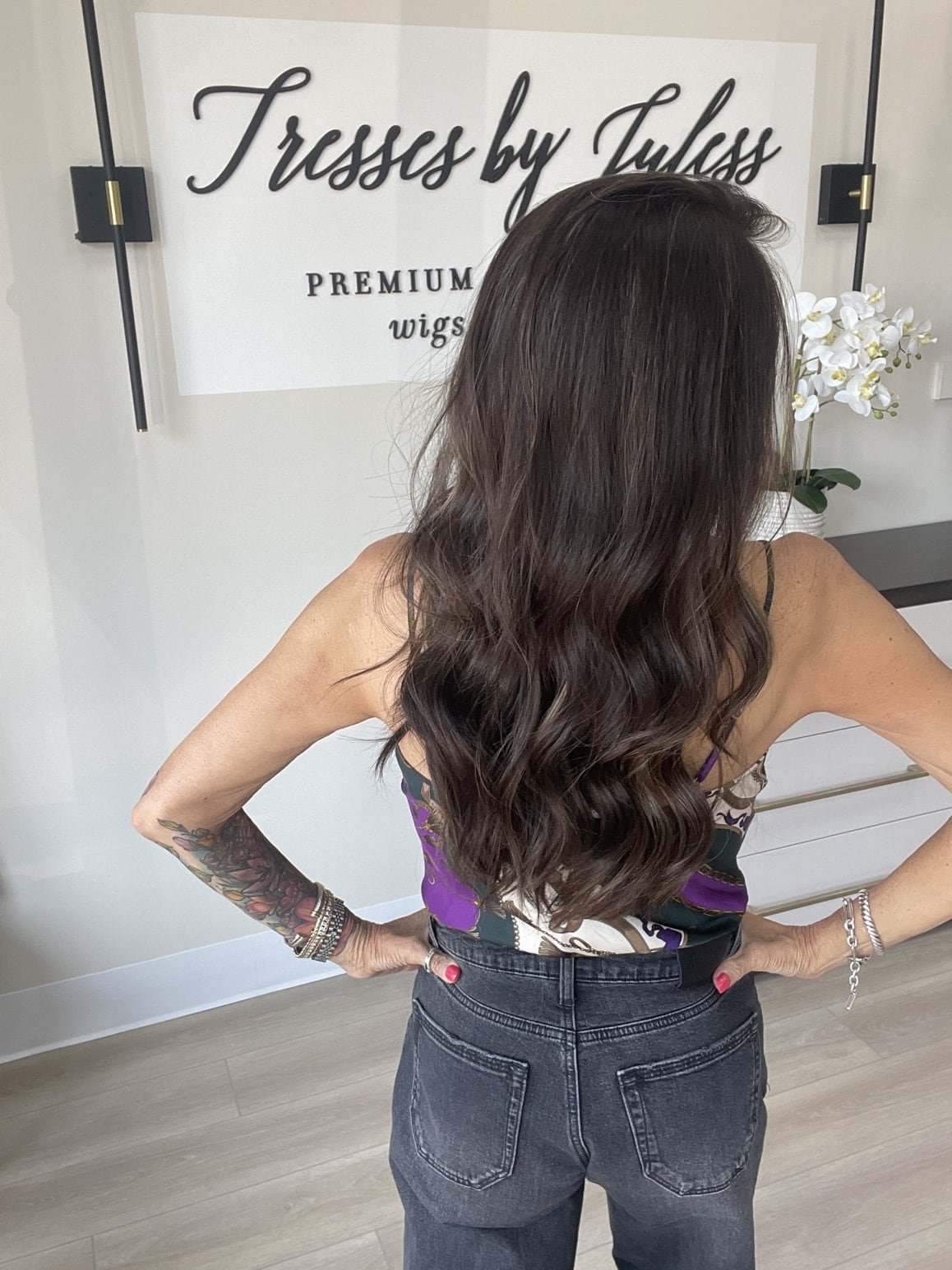Brunette_human_hair_wig_with_caramel_highlights_worn_by_a_woman_in_Folsom_Studio__.jpg