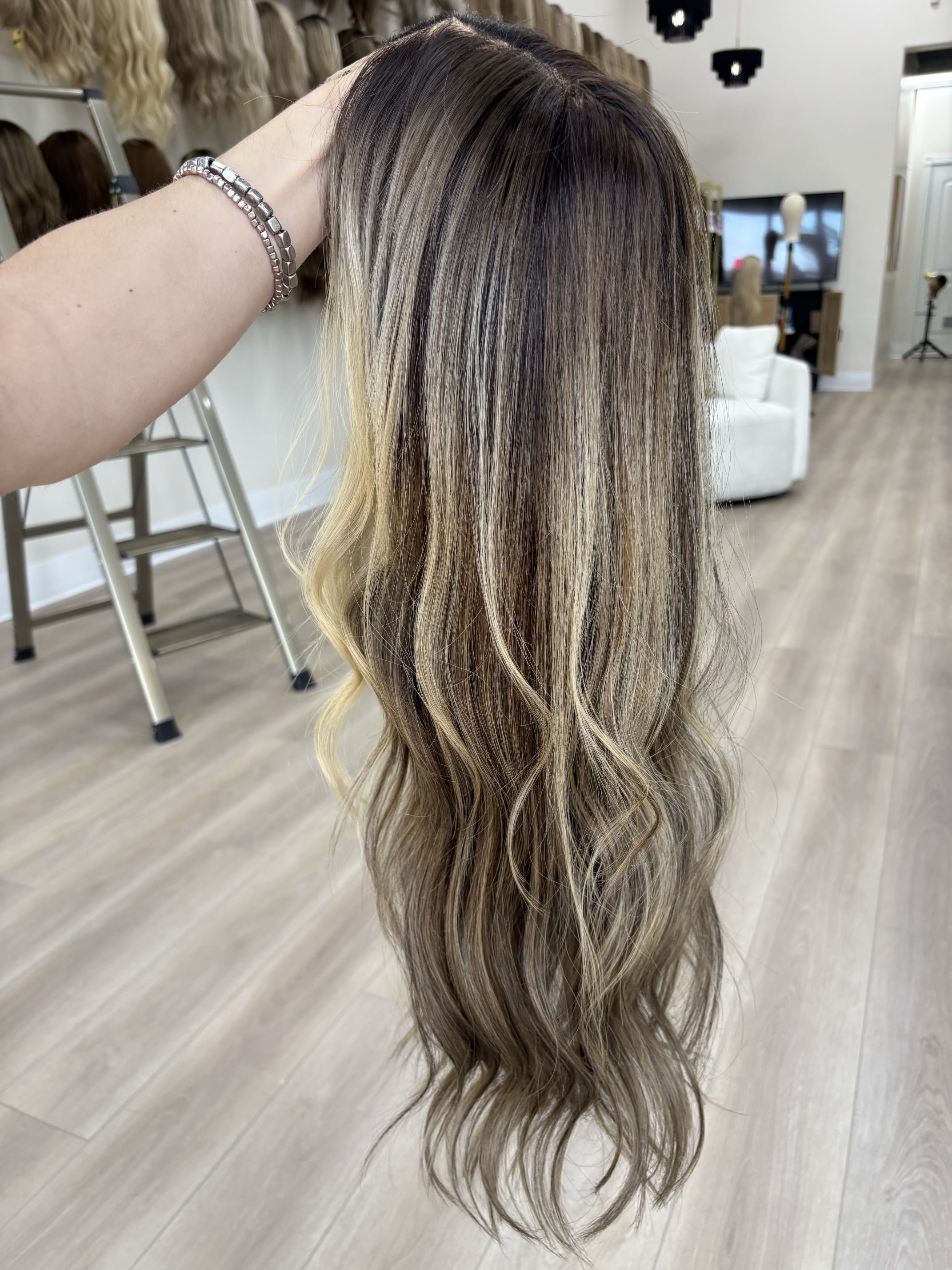 _Curly_honey_blonde_wig_on_a_woman_at_Tresses_By_Juless_Studio__Folsom__California___.jpg