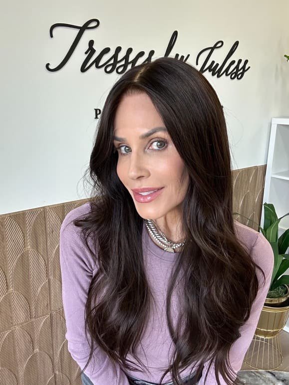 _Woman_with_long_brunette_wavy_human_hair_wig_in_Tresses_By_Juless_Studio__Folsom___.jpeg