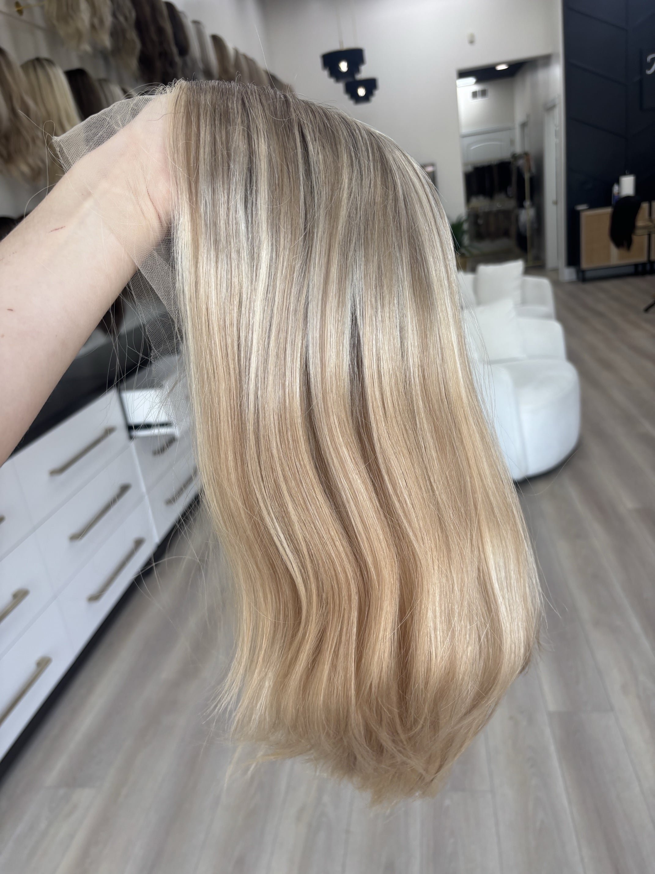 _Middle_aged_woman_wearing_a_custom_colored_blonde_bob_wig_in_Folsom__California___.jpg