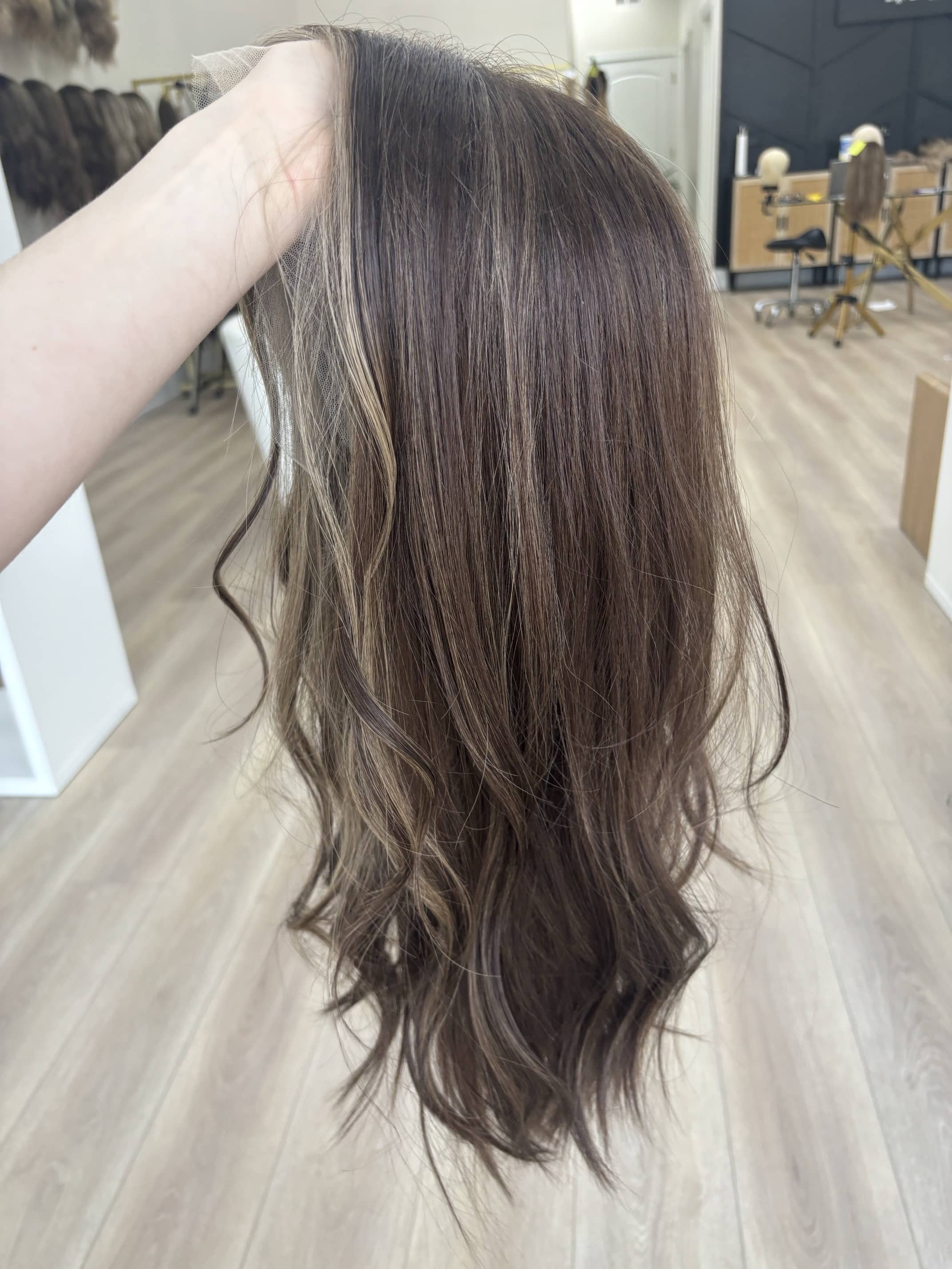Elegant_dark_brown_human_hair_wig_worn_by_a_woman_in_Sacramento_Studio__.jpg
