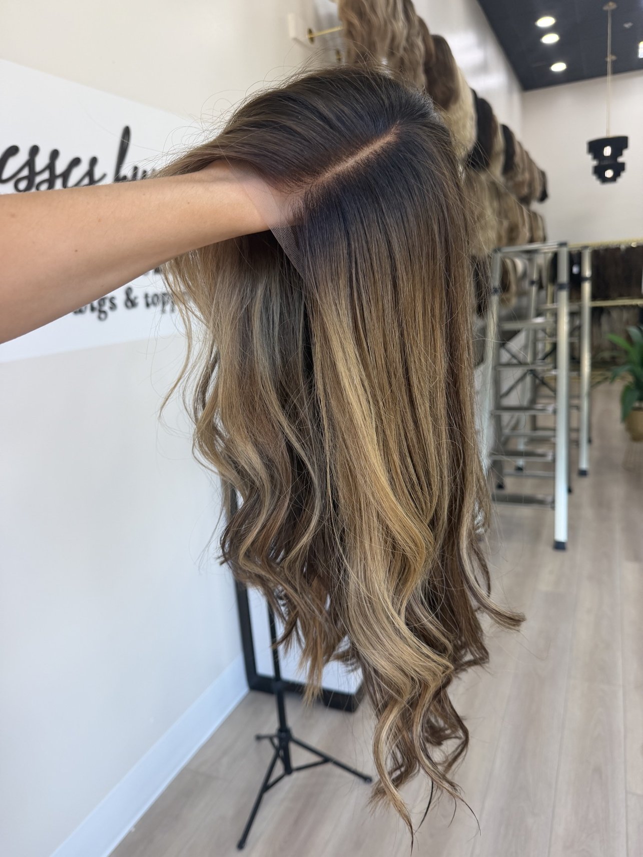 _Model_wearing_a_custom_made_wig_at_the_Folsom_Tresses_By_Juless_Studio__designed_to_empower_women_facing_hair_loss___.jpg