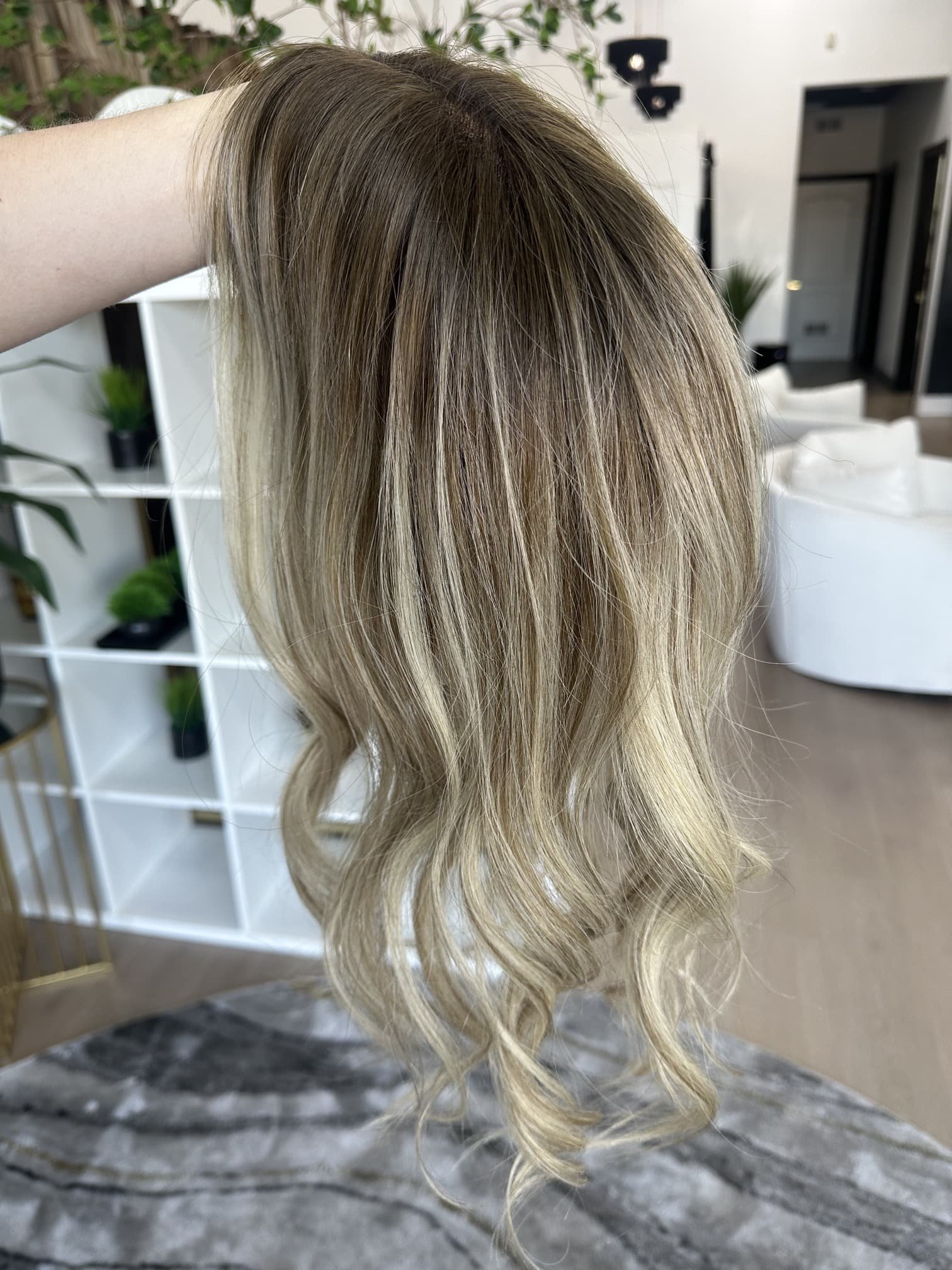 _Elegant_brunette_wig_with_natural_highlights__styled_on_a_woman_in_Sacramento_Studio___.jpg