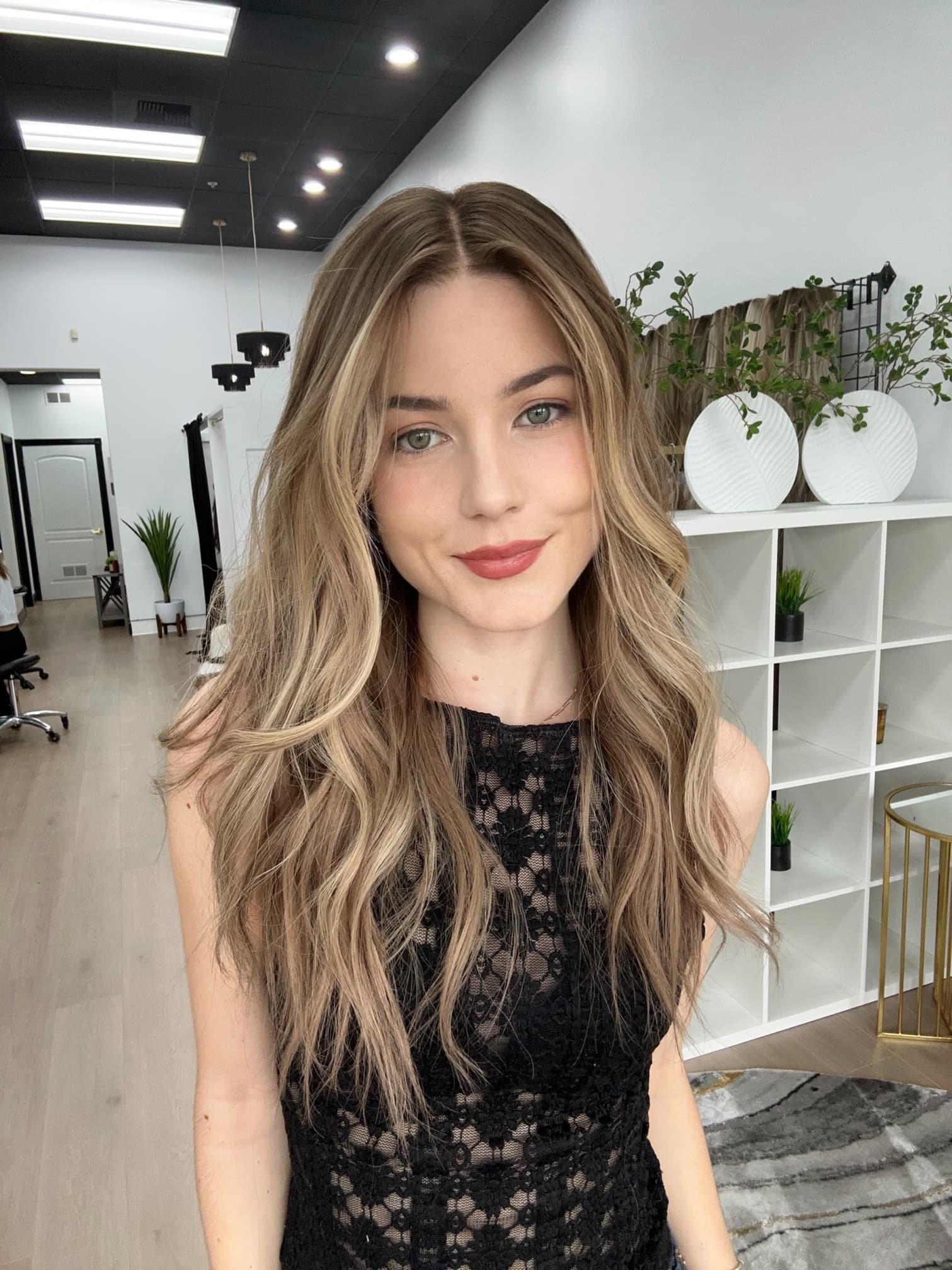 _Elegant_brunette_wig_with_natural_highlights__styled_on_a_woman_in_Sacramento_Studio___.jpg