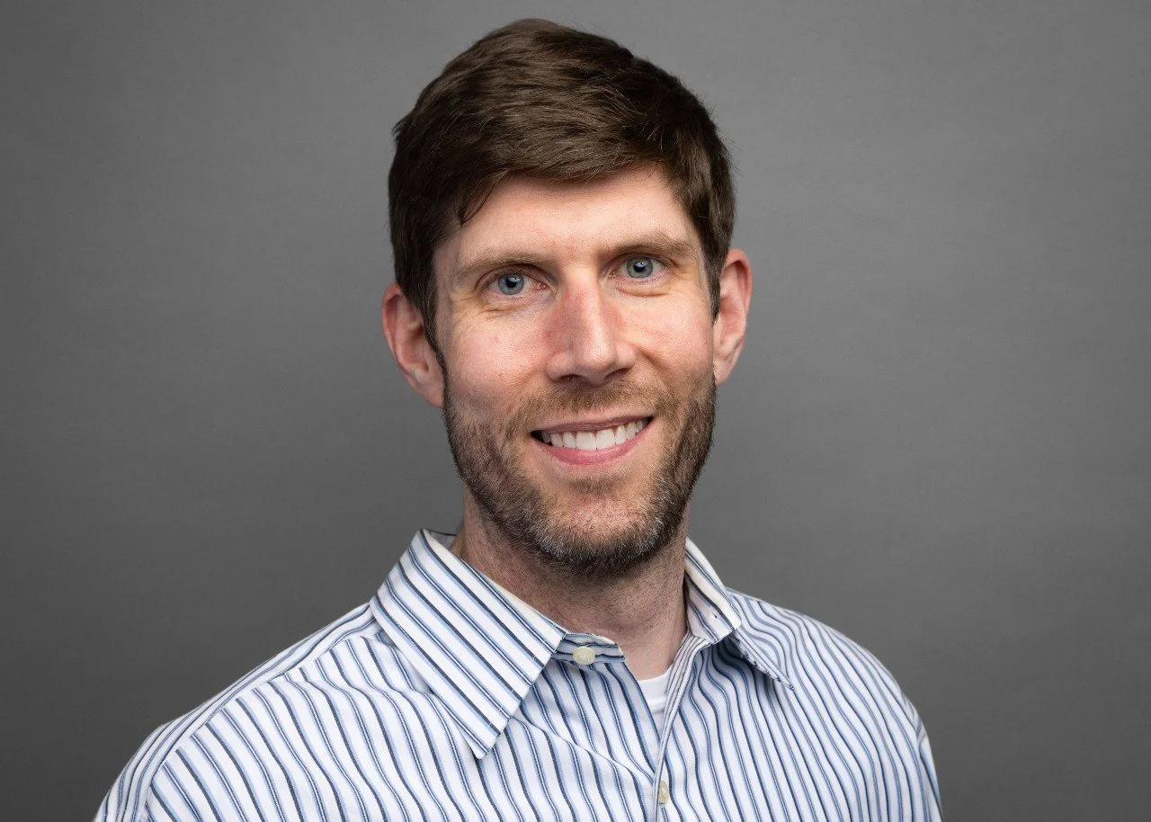 Copy of Adam Headshot -small.jpg