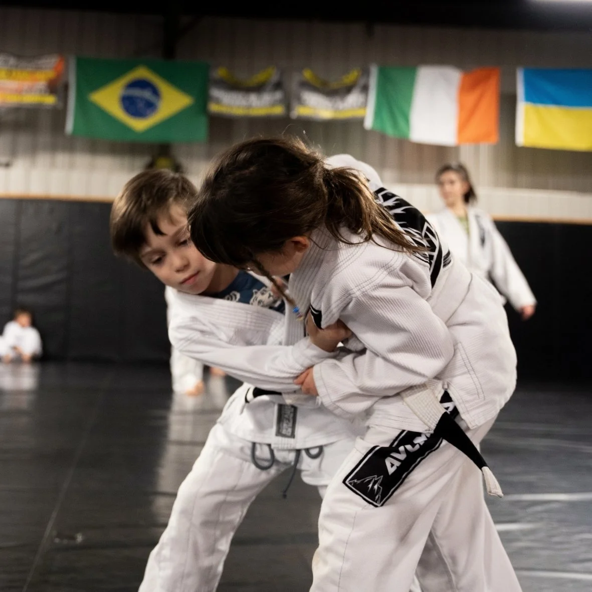 Kids Judo, two children practicing judo throws