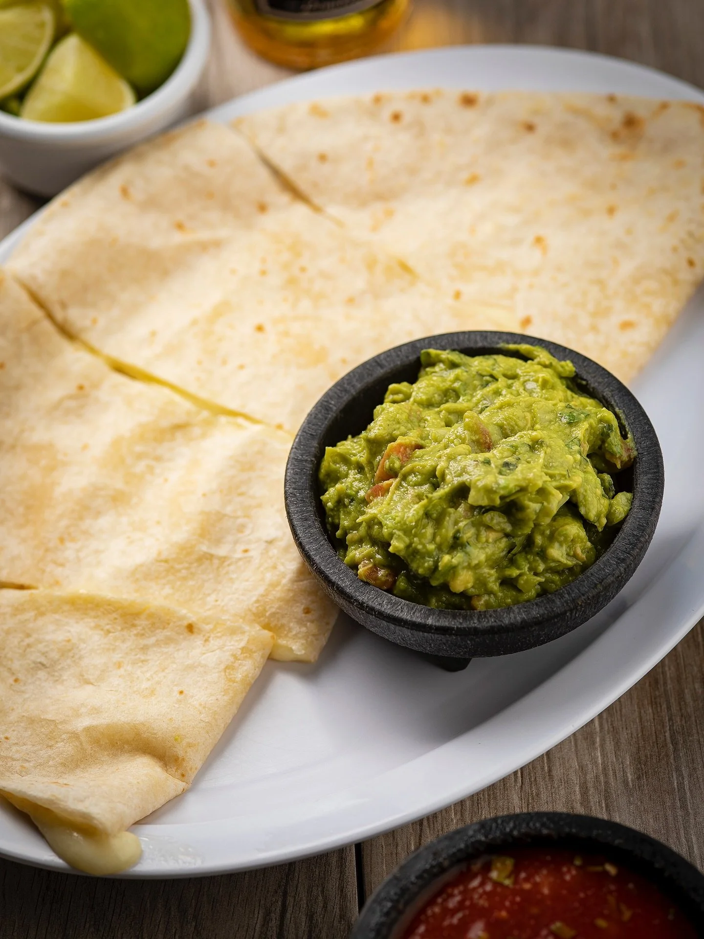 Simple, cheesy, and made to share 🧀

✨Our quesadilla served with fresh guac is the comfort food you didn&rsquo;t know you needed. Add a squeeze of lime and you&rsquo;re set! 🌮🥑 

#taqueriaaurora #quesadillalove #guacgoal