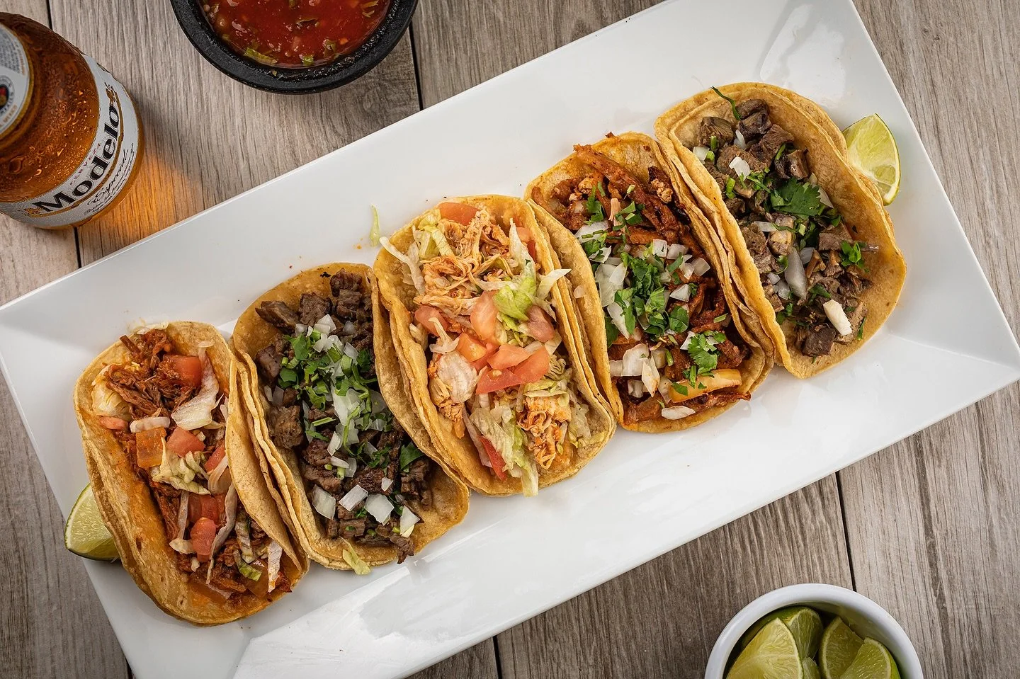 ✨Nothing says Friday like a plate full of tacos and a cold drink to match. 🍻 Come get yours today!