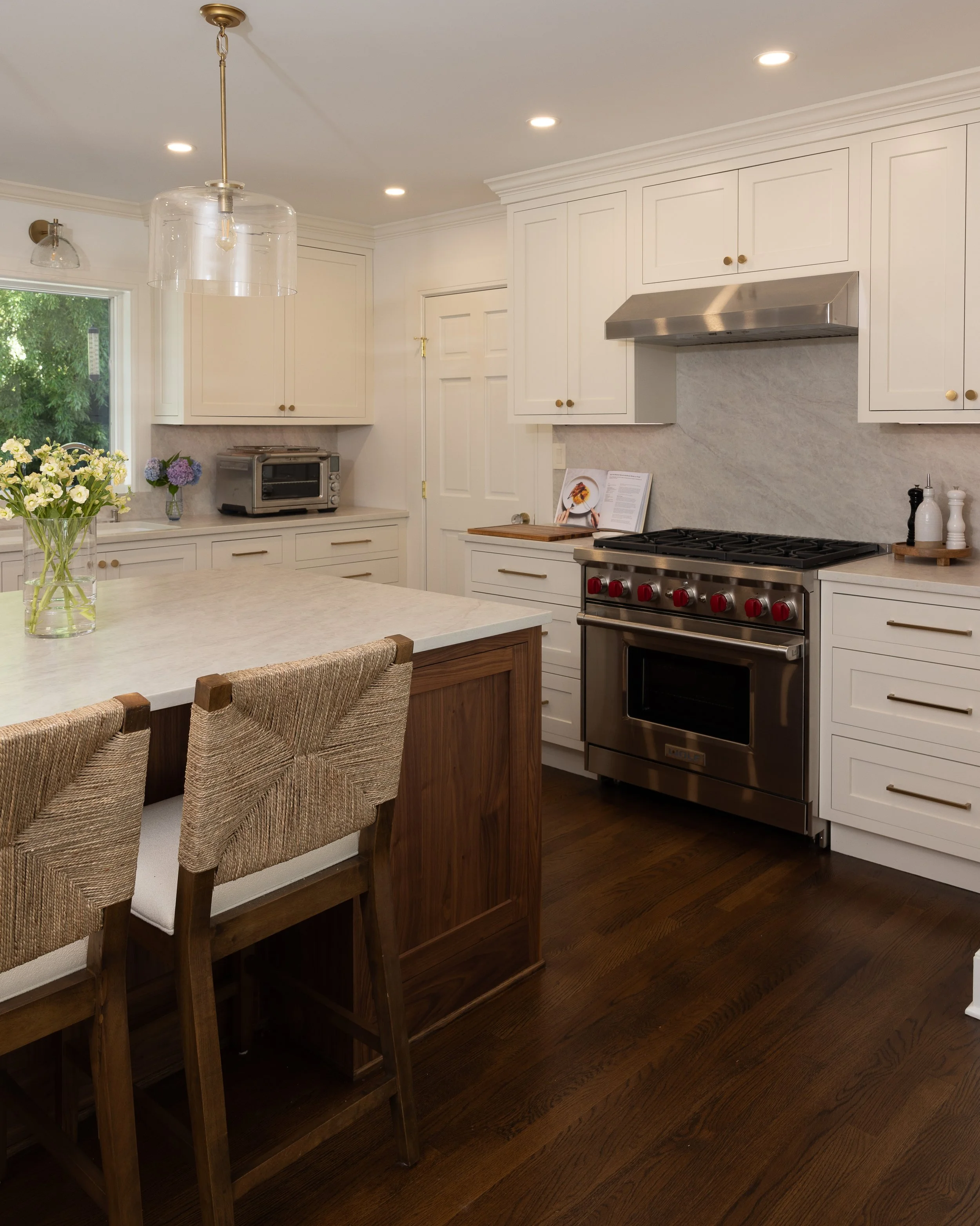 and island in front of a stainless range